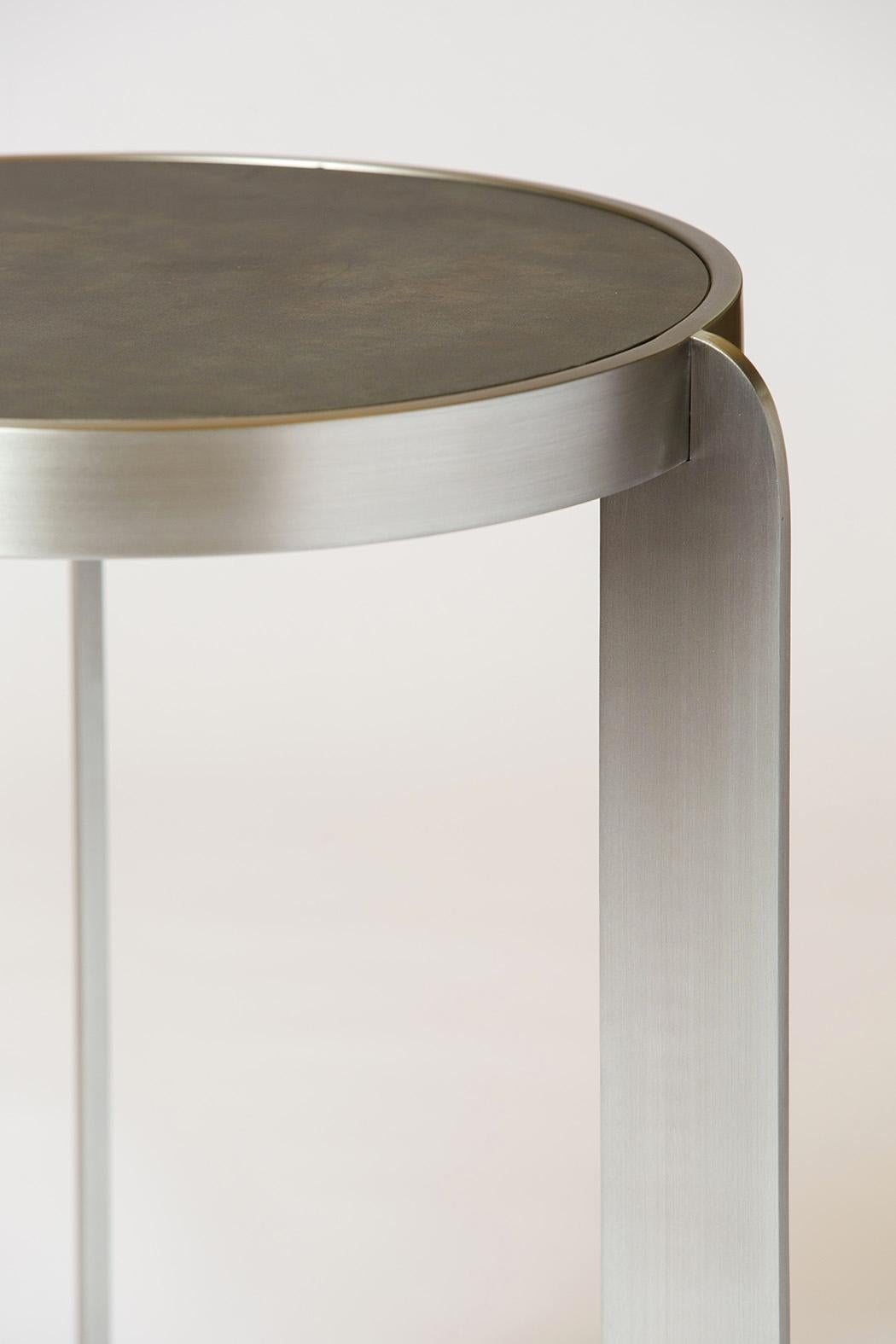 Materico Side table is defined by sophisticated simplicity that create an unexpected and iconic object. The enigmatic suggestions of his ceramic sculptures are likewise revealed in the forms of the Materico, where important and heavy materials, such