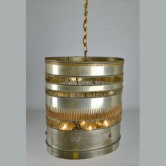 Metal Oval Pendant Decorated with  Brass Copper and Purple Stones