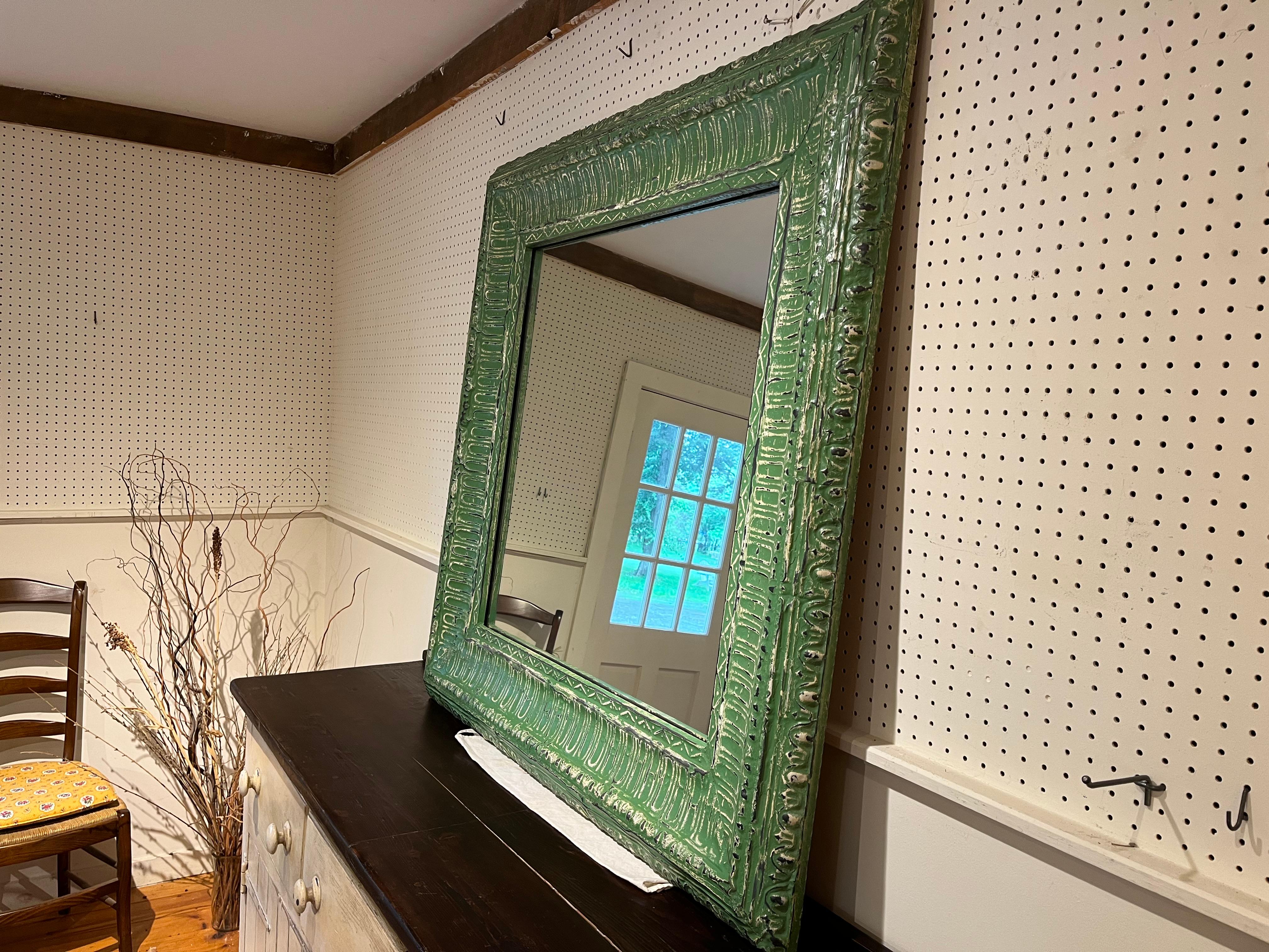This one of a kind mirror is simply smashing. it is square with a gorgeous detailed painted frame. Its simply beautiful.