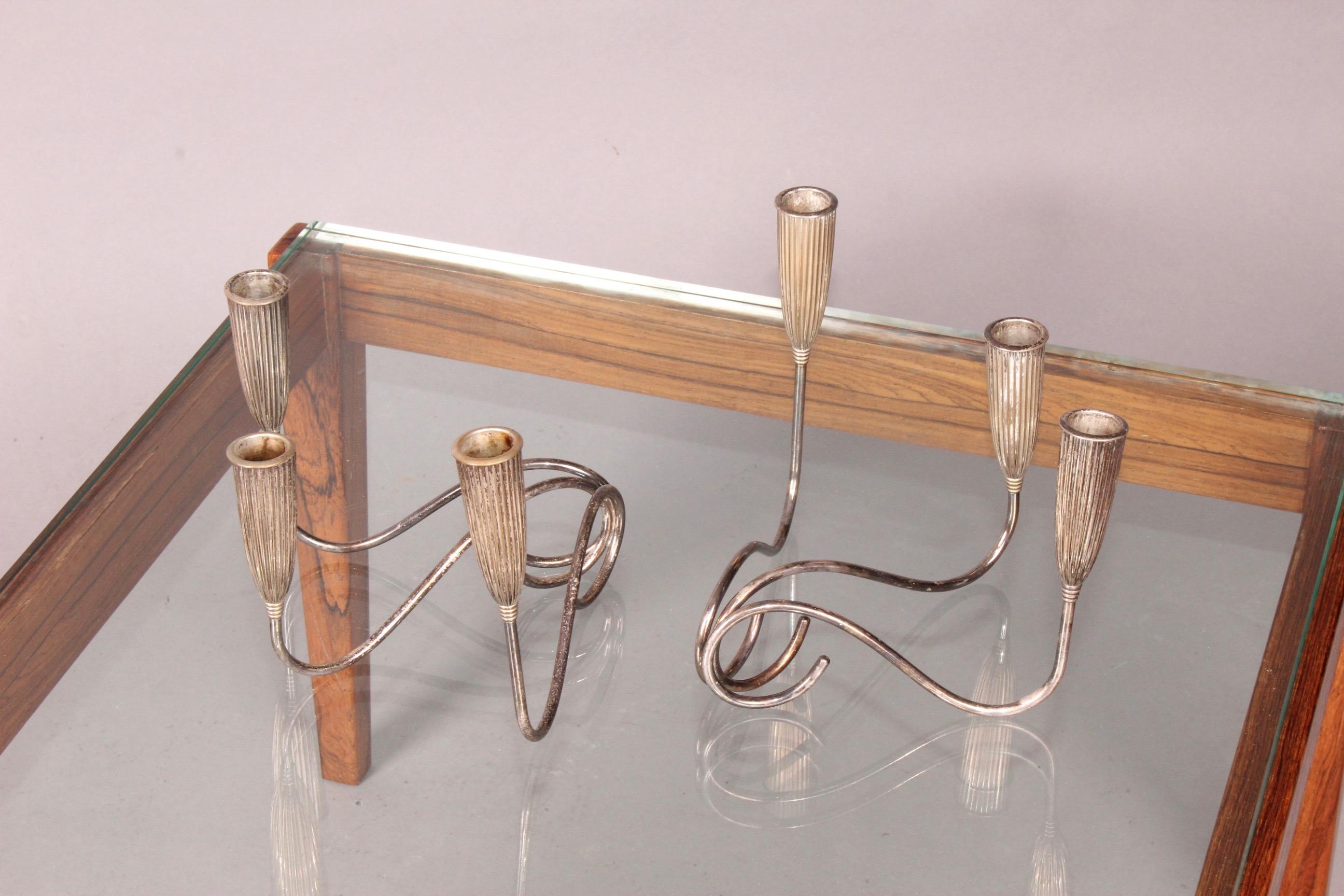 Metal pair of candlestick.