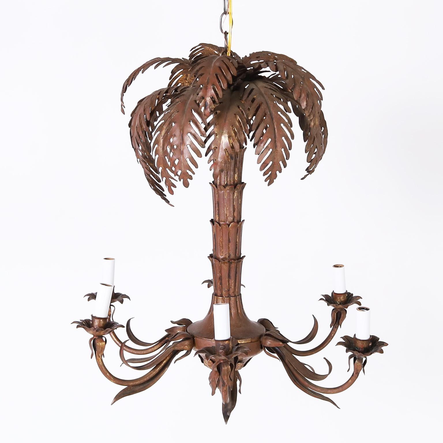 Italian six light chandelier or light fixture crafted in metal with a palm tree top and six arms with acanthus leaves all with an oxidized finish having traces of gold leaf.
