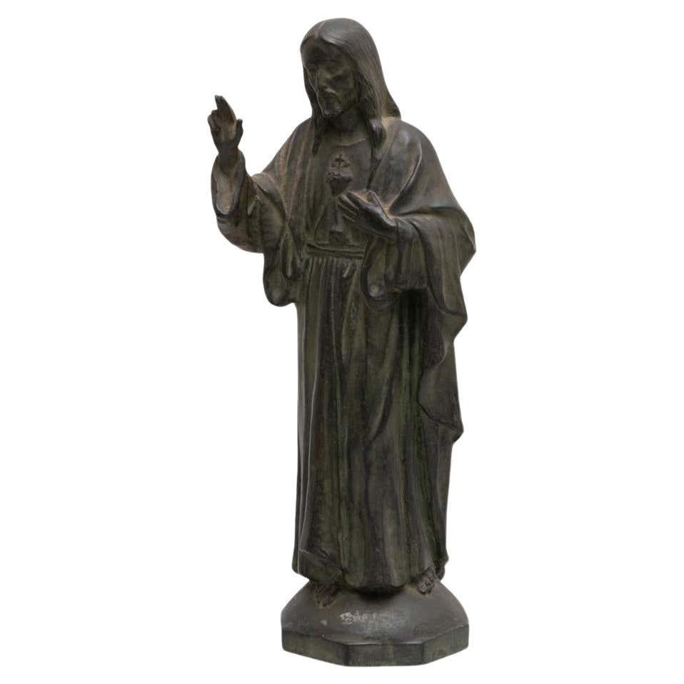 Figura de cerámica patinada de metal de Jesucristo, hacia 1950 en venta