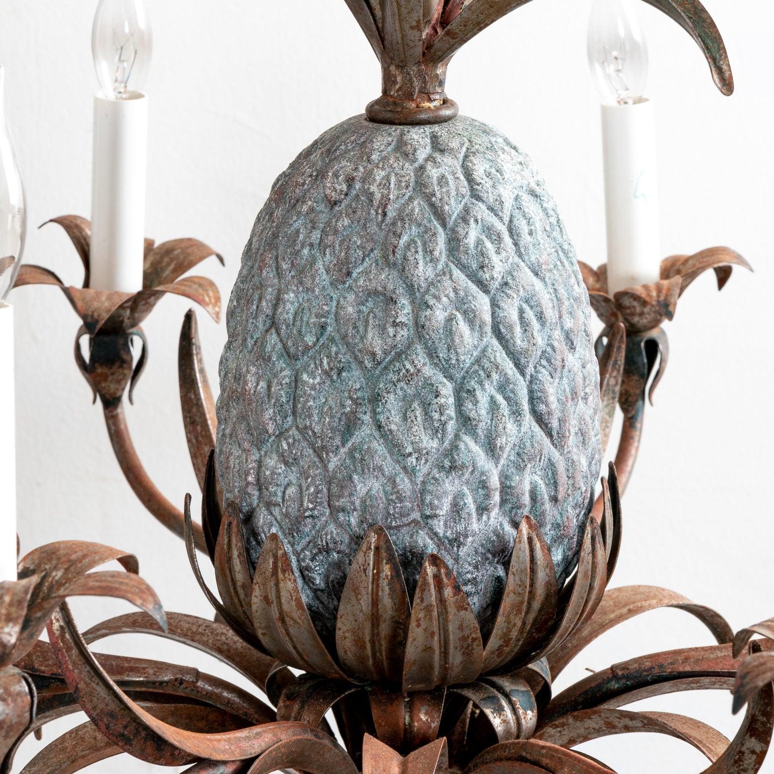 Circa 1970s Steel and Zinc multi arm chandelier with pineapple motif. Shades not included. Made in Italy. Please note of wear consistent with age including stripped paint, patina, and oxidation to the metal.