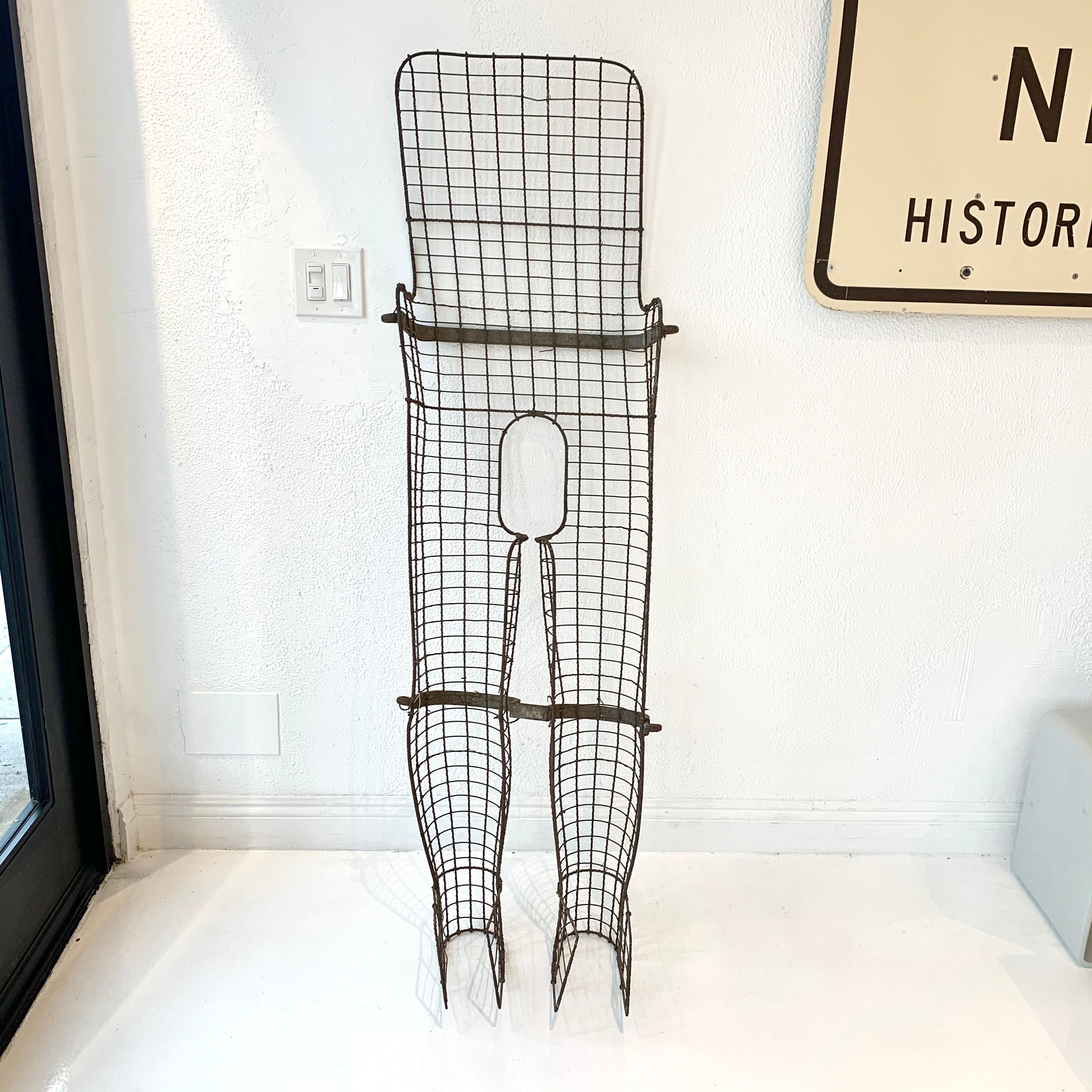 Unusual metal stretcher from the French Alps, circa 1960. Thick metal bars with wire frame. Great piece for a winter home. Good vintage condition.