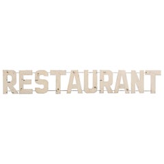 Enseigne de restaurant en métal