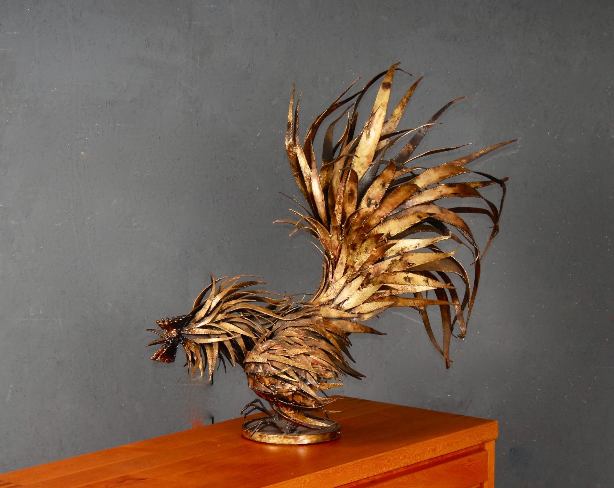 Big metallic rooster sculpture. The feathers seem like they are in movement which brings dynamic to the sculpture making it look almost alive.
Unknown artist but most probably European.