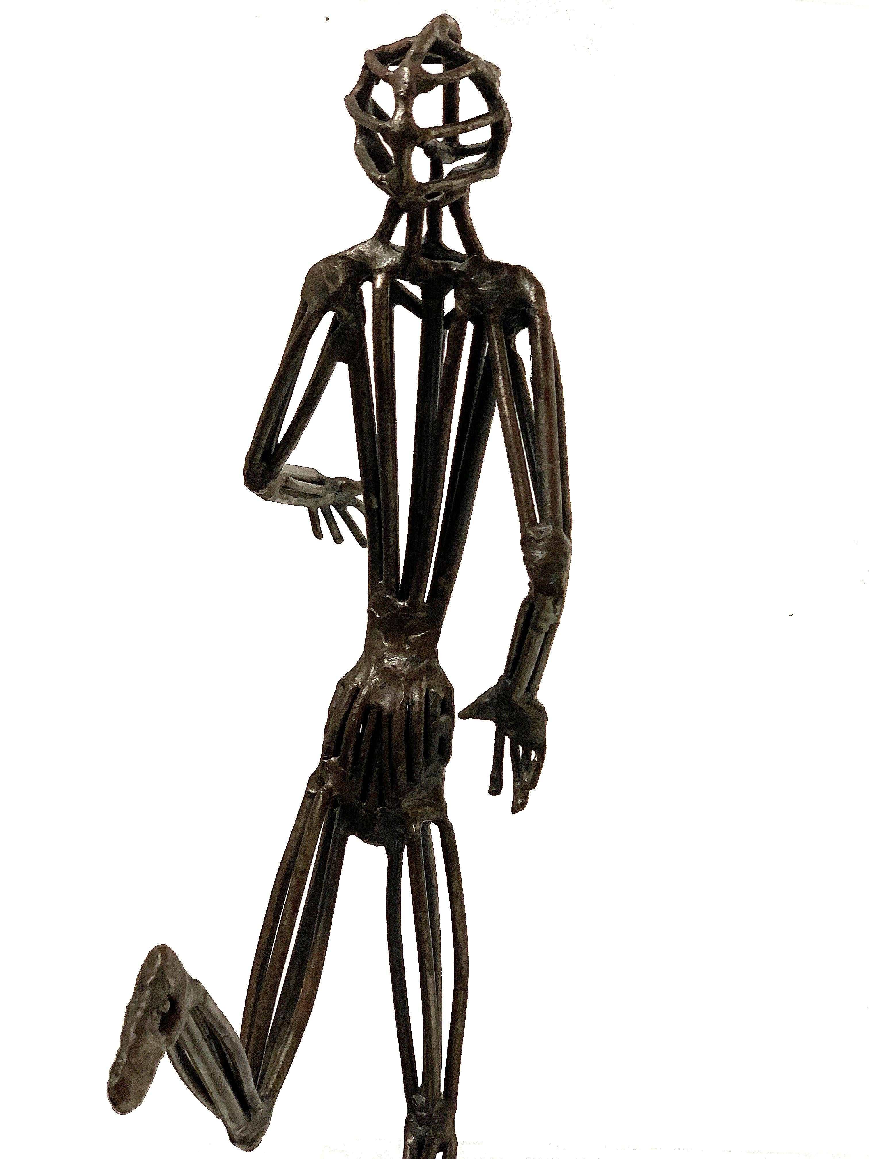 Metal runner sculpture by Pittsburgh artist William J. Wessel. The figure is well balanced and has a pleasant stride, as though enjoying a long run.