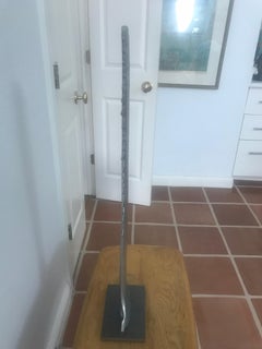 Metal Sawtooth Fish Bill on Steel Stand