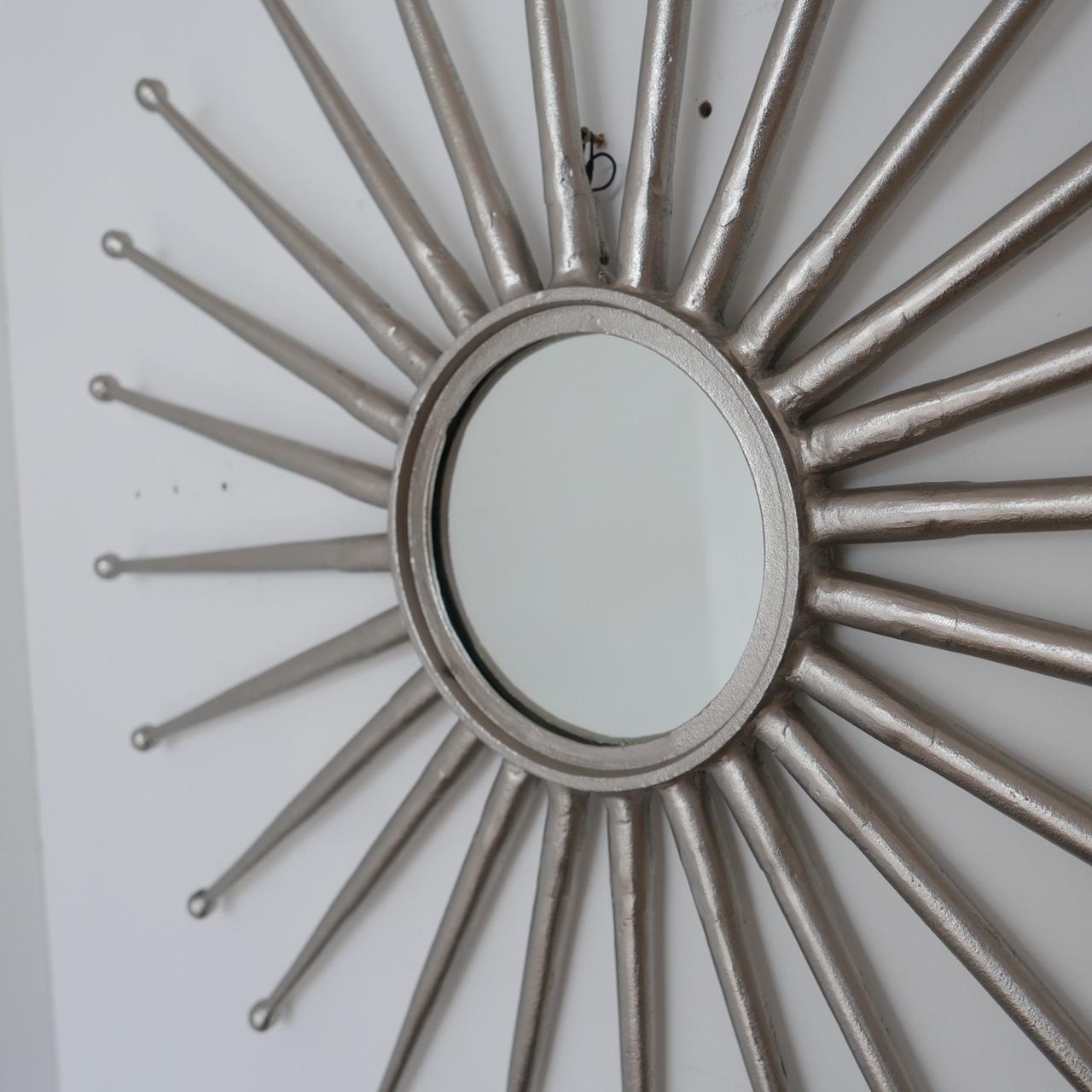 A good quality metal mirror in the form of a starburst.

Likely aluminium, French, mid-late 20th century.

Dimensions: 82 diameter x 3.5 depth in cm.

 