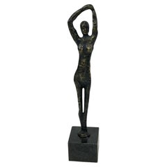 Sculture figurative in metallo