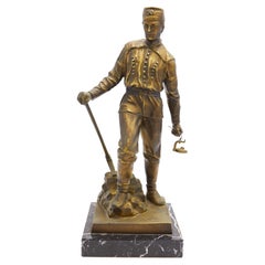 Metal Statuette on a Marble Base