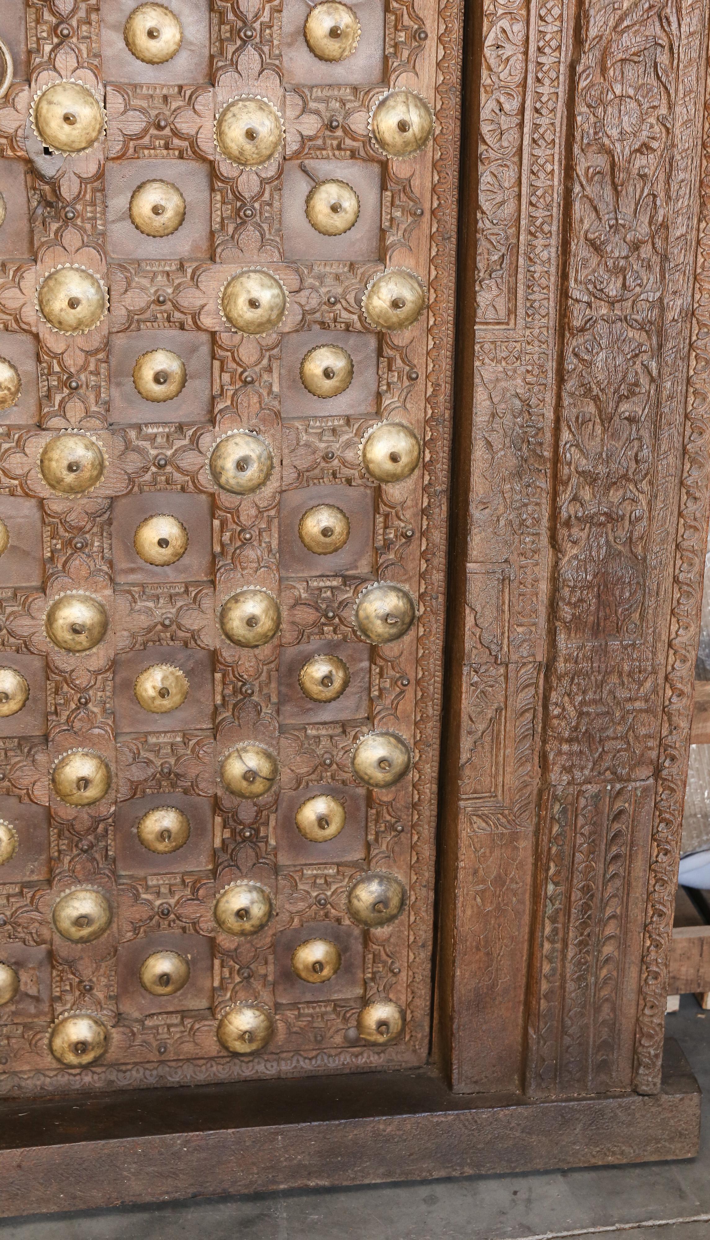 Metal Studded Highly Carved Solid Teak Wood Entry Door of a Temple Priest Home 1