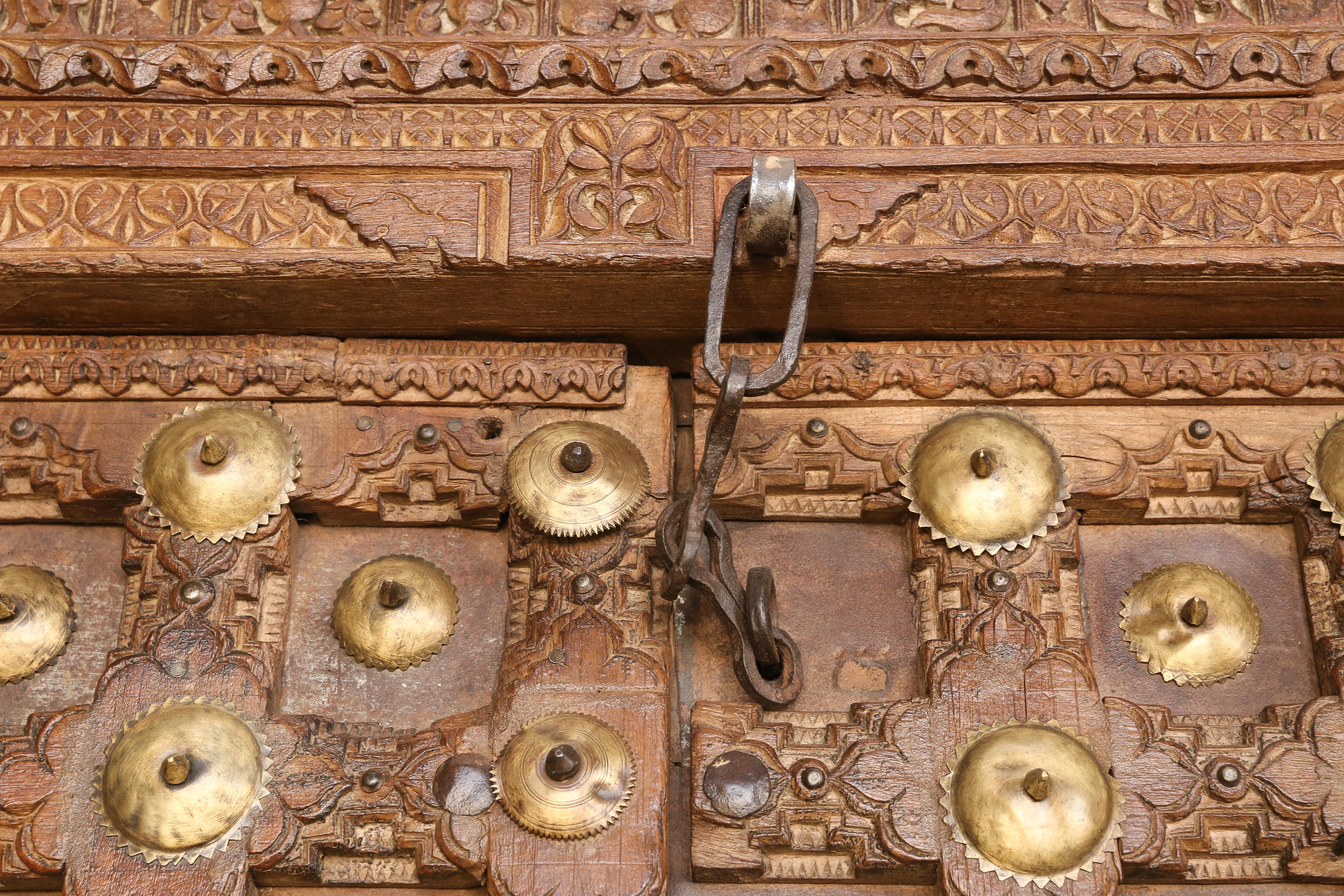 Metal Studded Highly Carved Solid Teak Wood Entry Door of a Temple Priest Home In Good Condition In Houston, TX