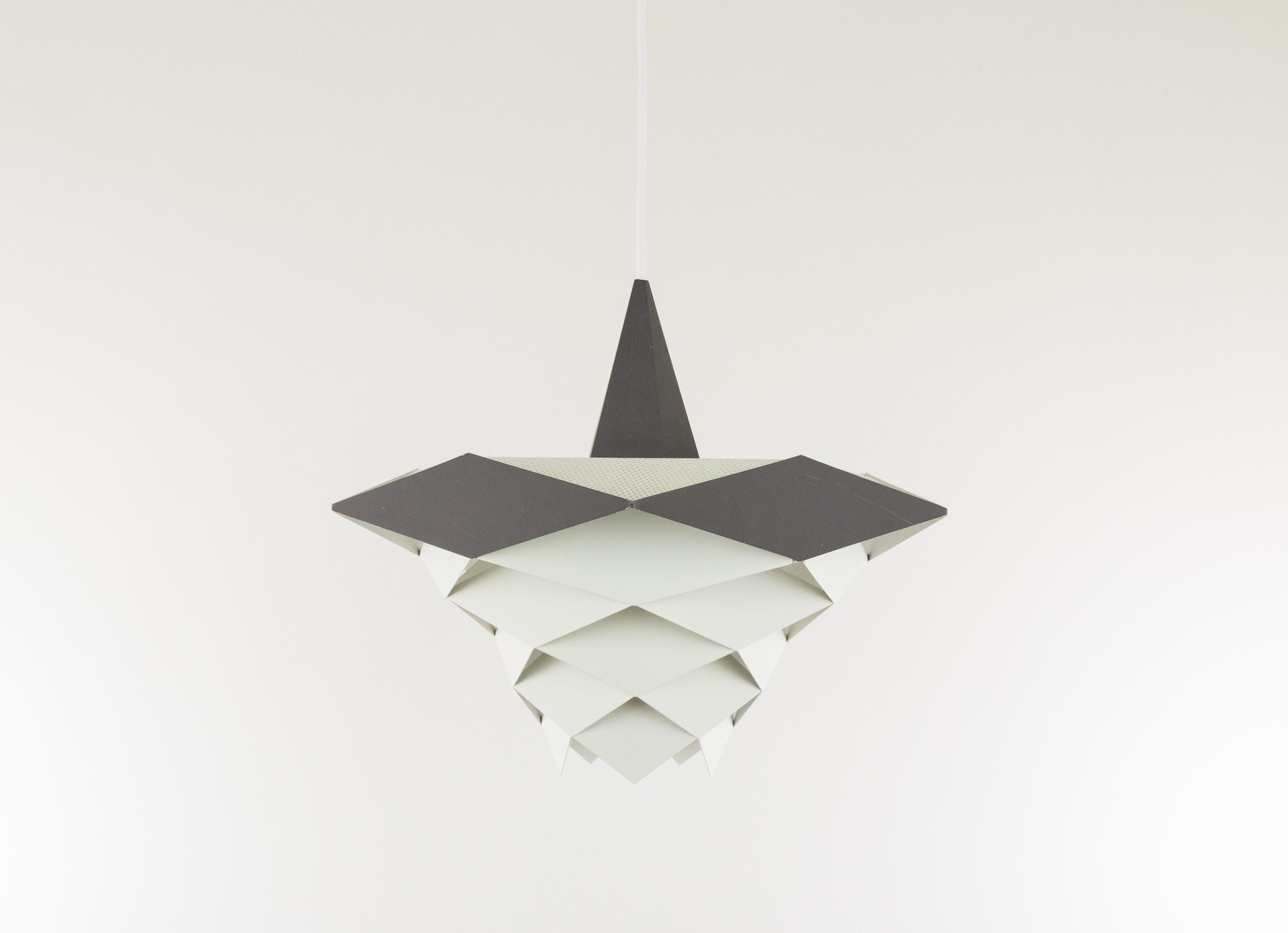 Rare medium sized pentagonal pendant designed by Preben Dahl in the early 1960s and produced by Danish lighting manufacturer Hans Følsgaard Belysning.

The lamp is part of the 'Symfoni' lighting series, consisting of ceiling lights and pendants
