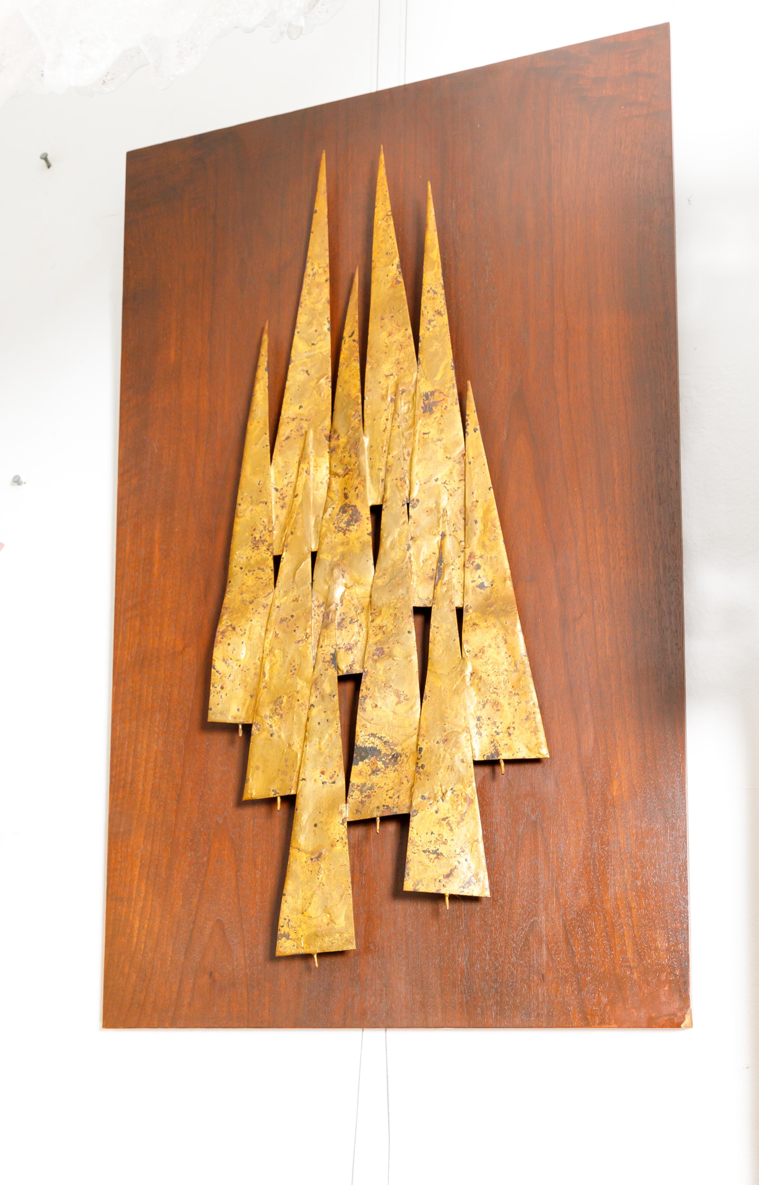 Metal tree form sculpture mounted on walnut plank.