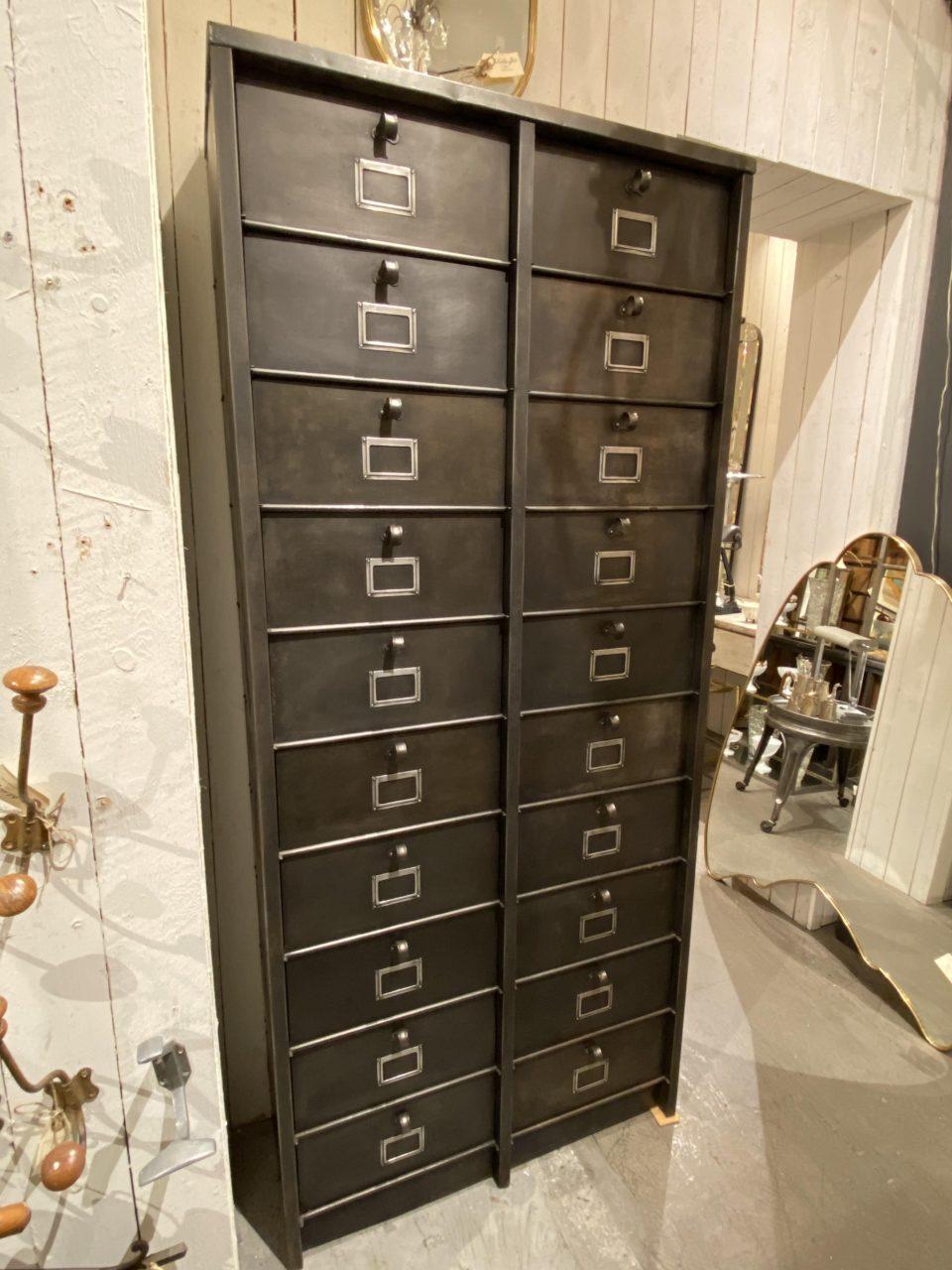 Tall and slim vintage cabinet filing cabinet, in a cool raw metal look. We have deacidified it from the old paint remnants, treated and polished the piece, so now it appears raw and inviting in a dark masculine and industrial look. These filing