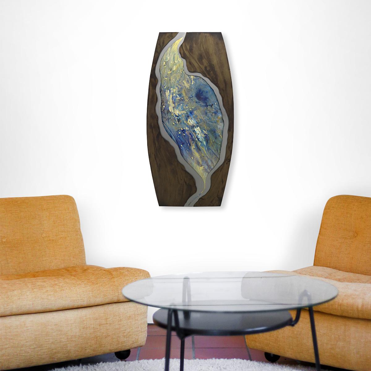 Stunning piece of art by the famous American wall sculpture specialist Curtis Jeré depicting a particularly colorful layer of the earth. It is made of steel with enamel.
It dates from 2006 and is signed. Original product tag included.
