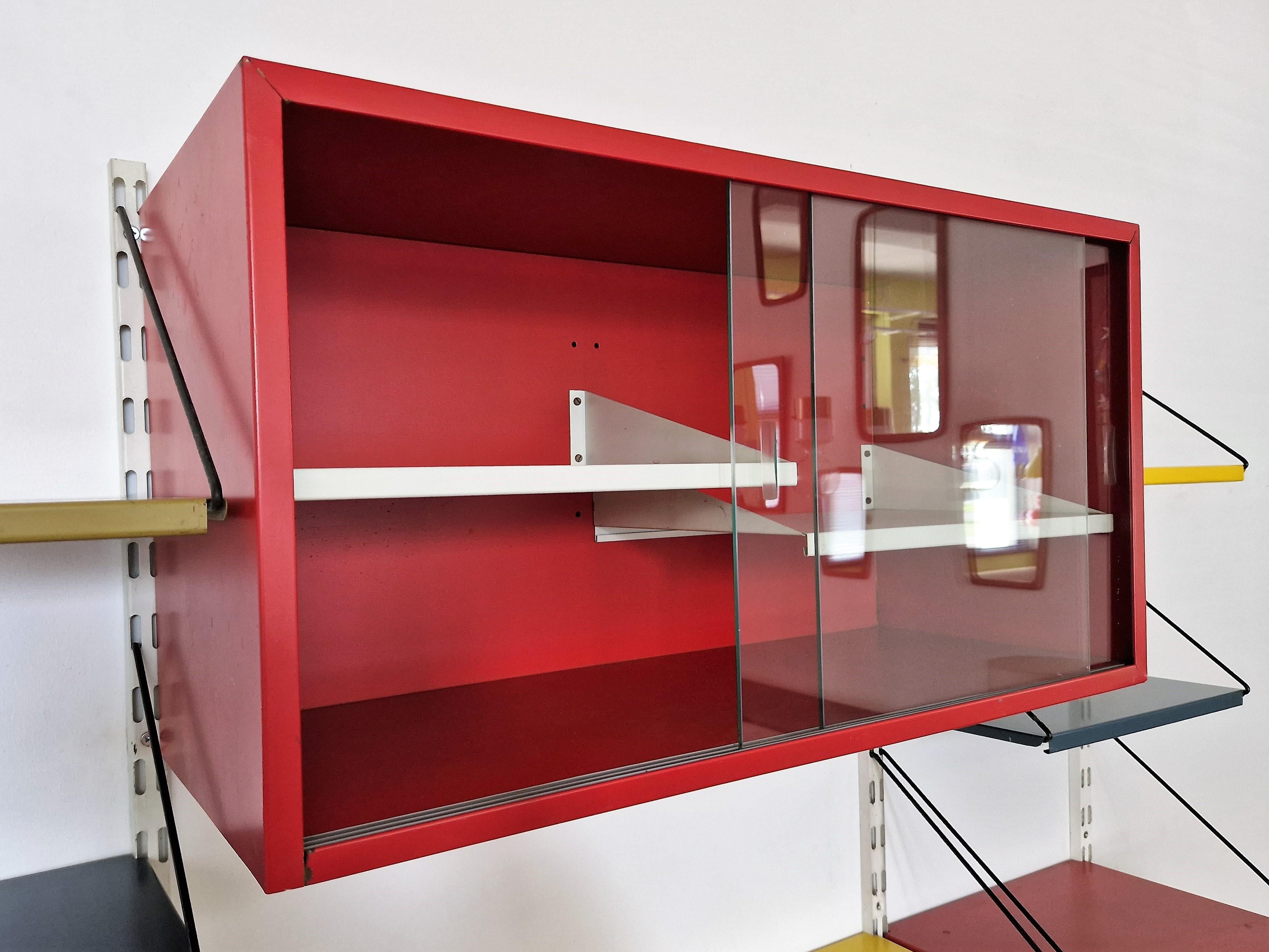 Mid-20th Century Metal Wall Unit in Red, Yellow and Blue by Tjerk Rijenga for Pilastro, 1950's For Sale