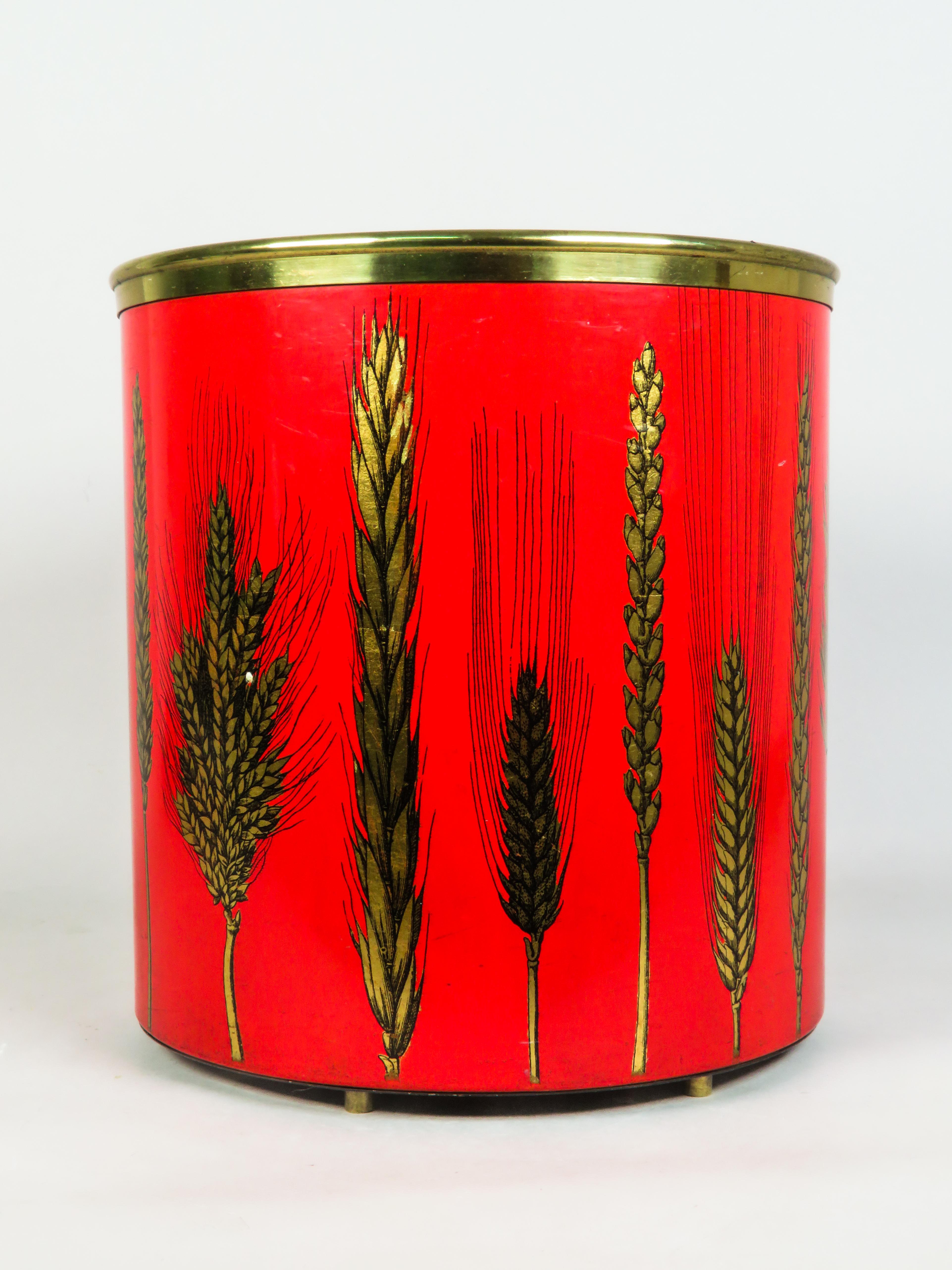 Italian Metal wastebasket with a gold herringbone design and red lacquered base For Sale