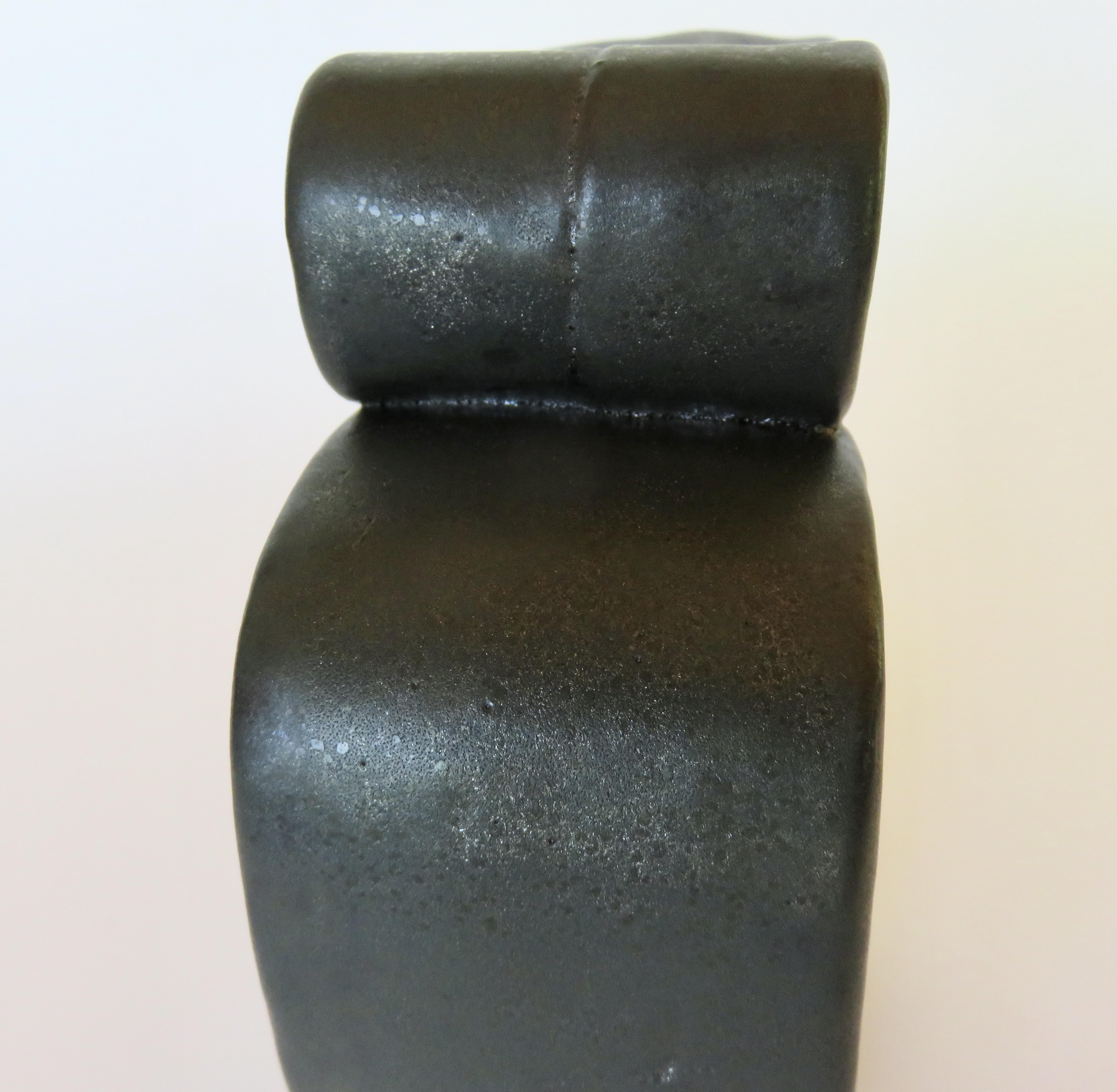 Metallic Black Hand-Built Ceramic Sculpture with Hollow Rings on Angled Legs 5