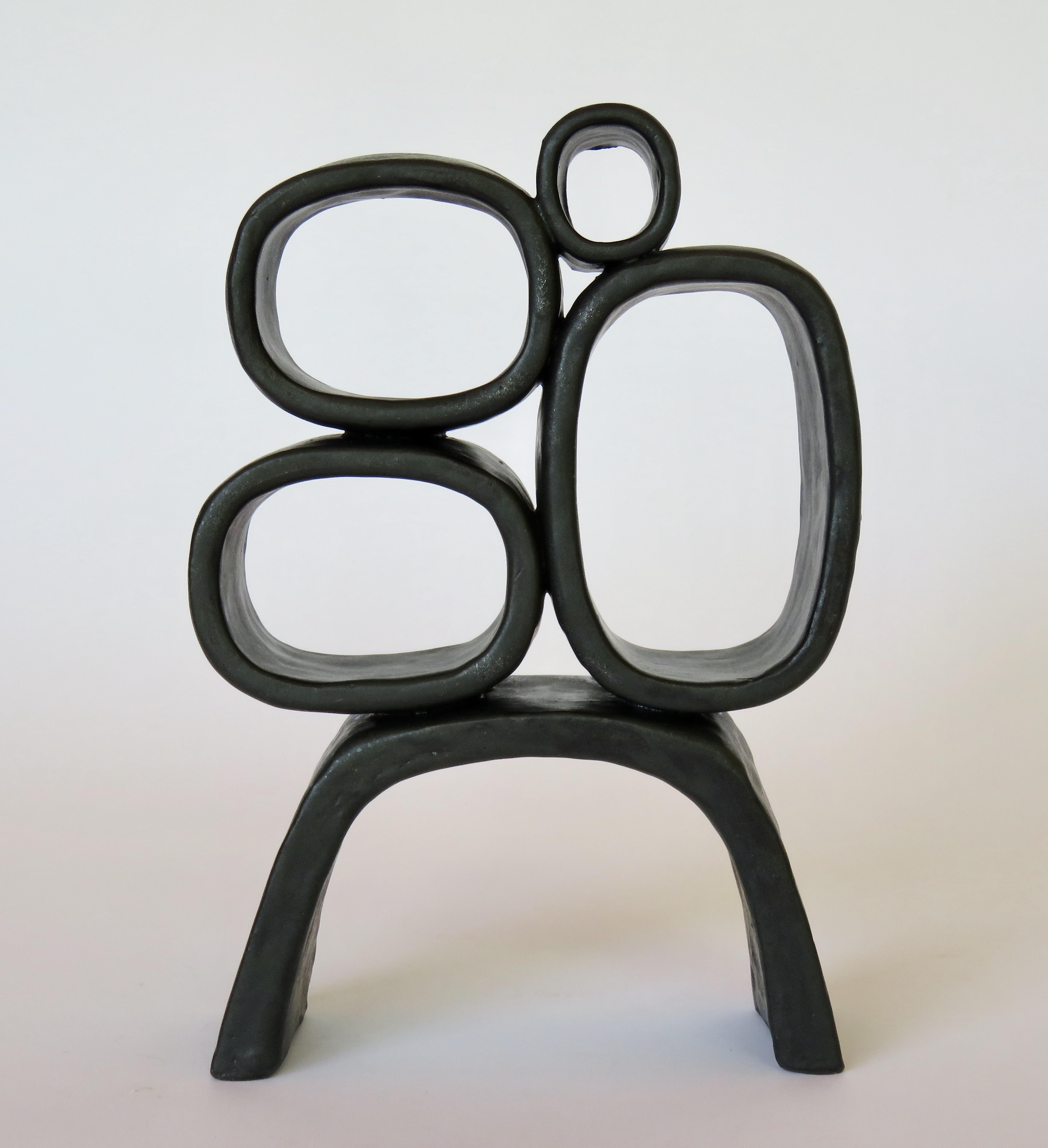 Metallic Black Hand-Built Ceramic Sculpture with Hollow Rings on Angled Legs In New Condition In New York, NY