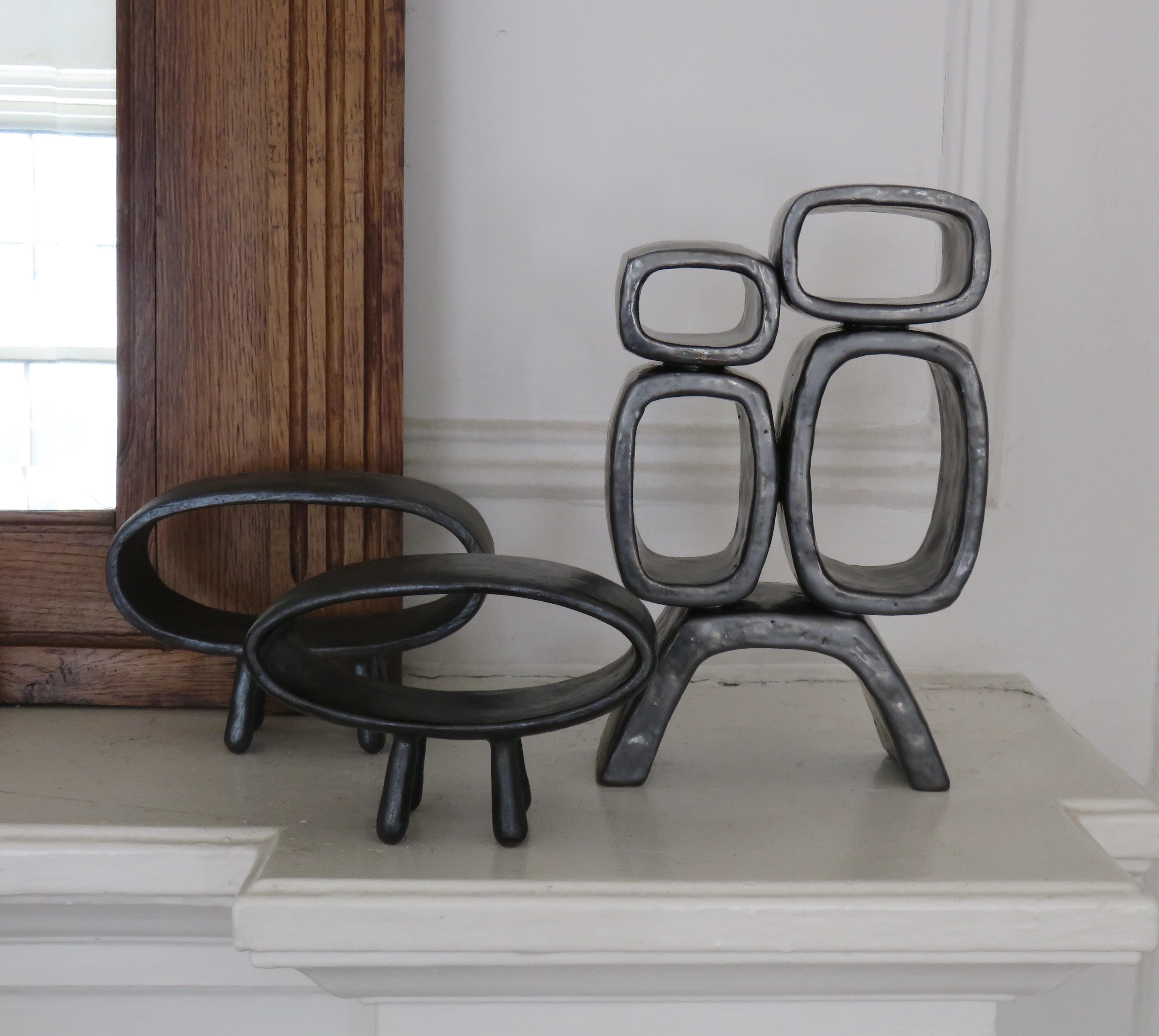 Metallic Black Hand-Built Ceramic Sculpture with Small Rings on Legs 9