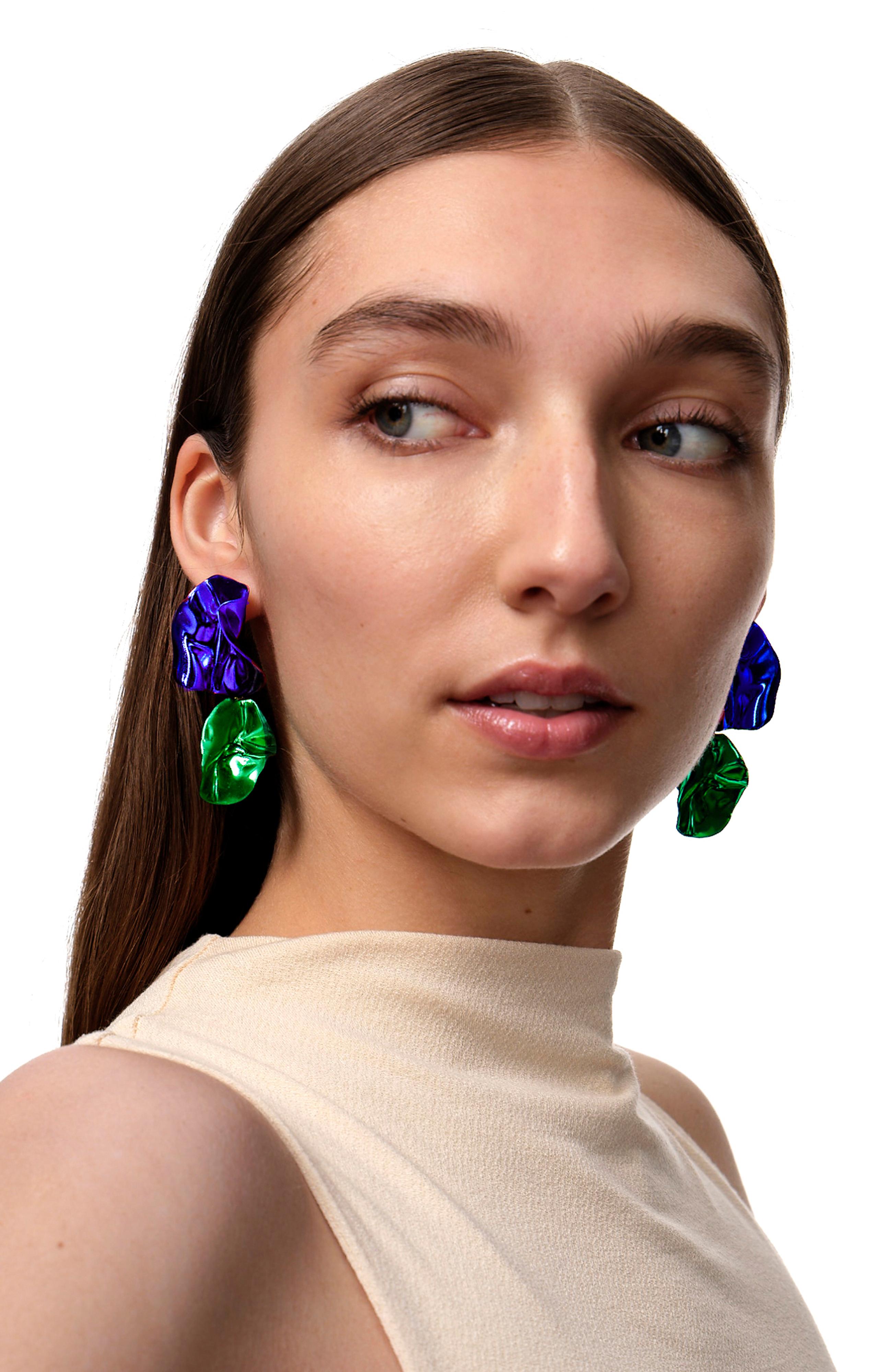The Fold Earrings are sculptural folded earrings in vibrant metallic Cobalt Blue and Emerald Green. Their intricate folds are highlighted by the high-polished Mirror Finish. Wear them for a pop of color this fall.

Ceramic coated
Sterling silver