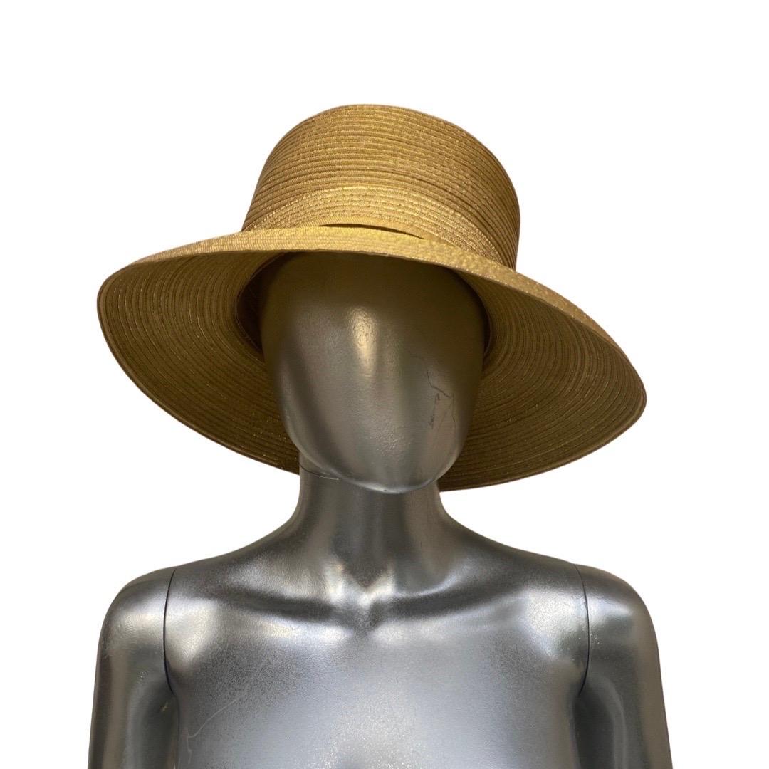 This beautiful hat was designed by the late Frank Olive for Neiman Marcus. His hats were collected by the rich and famous all over the world. This hat came from the closet of a well known Palm Springs Socialite and philanthropist. It’s a menswear