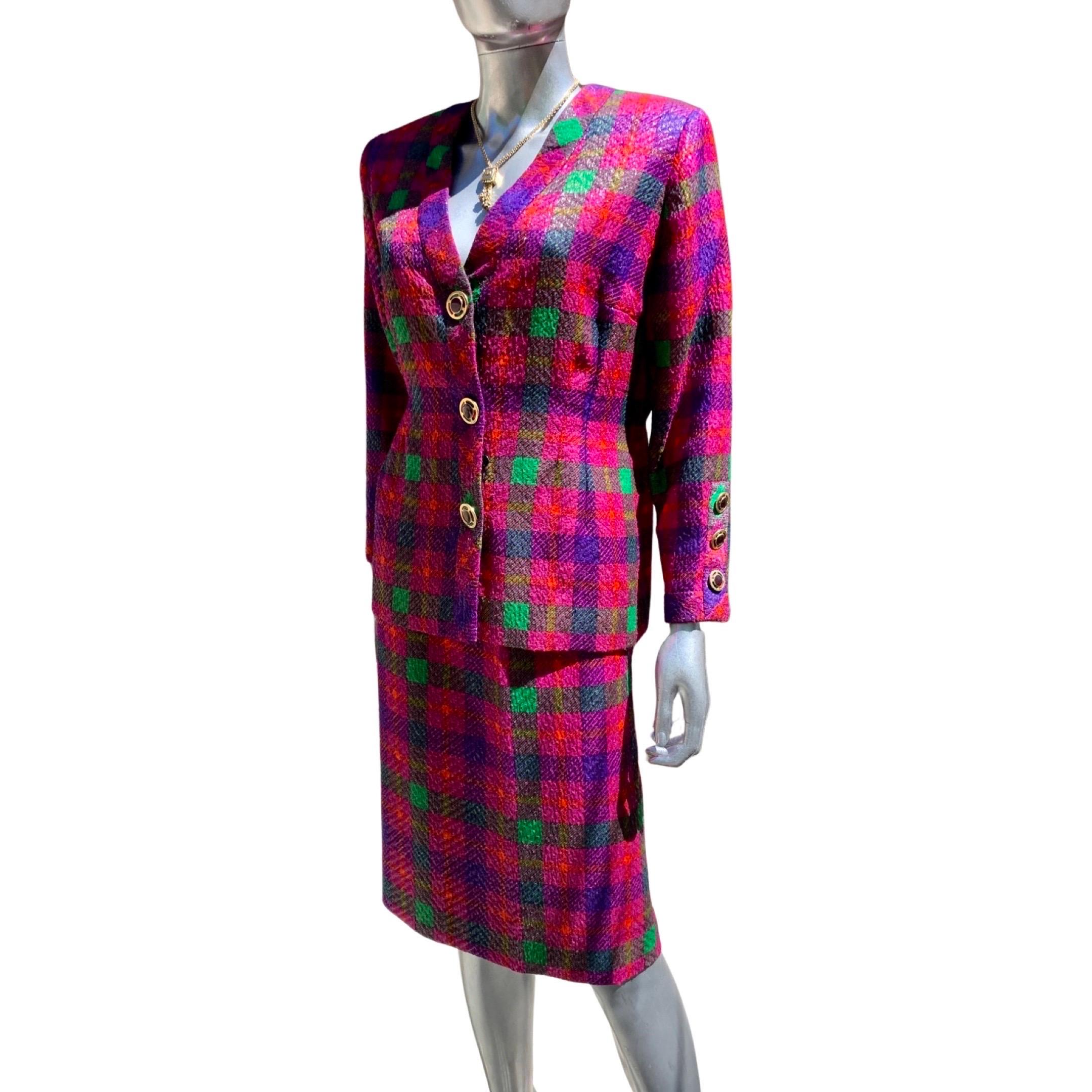 This beautiful custom made suit cane from the closet of a Philanthropist/Socialite Fashionista’s Closet. Custom made in Europe, one of a kind, in the 80s. The fabric is super luxe. A jewel-tone plaid woven with metallic threads. The suit is in the