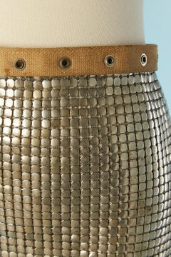 Metallic mesh worker apron with cotton belt and edge with eyelet on the bottom