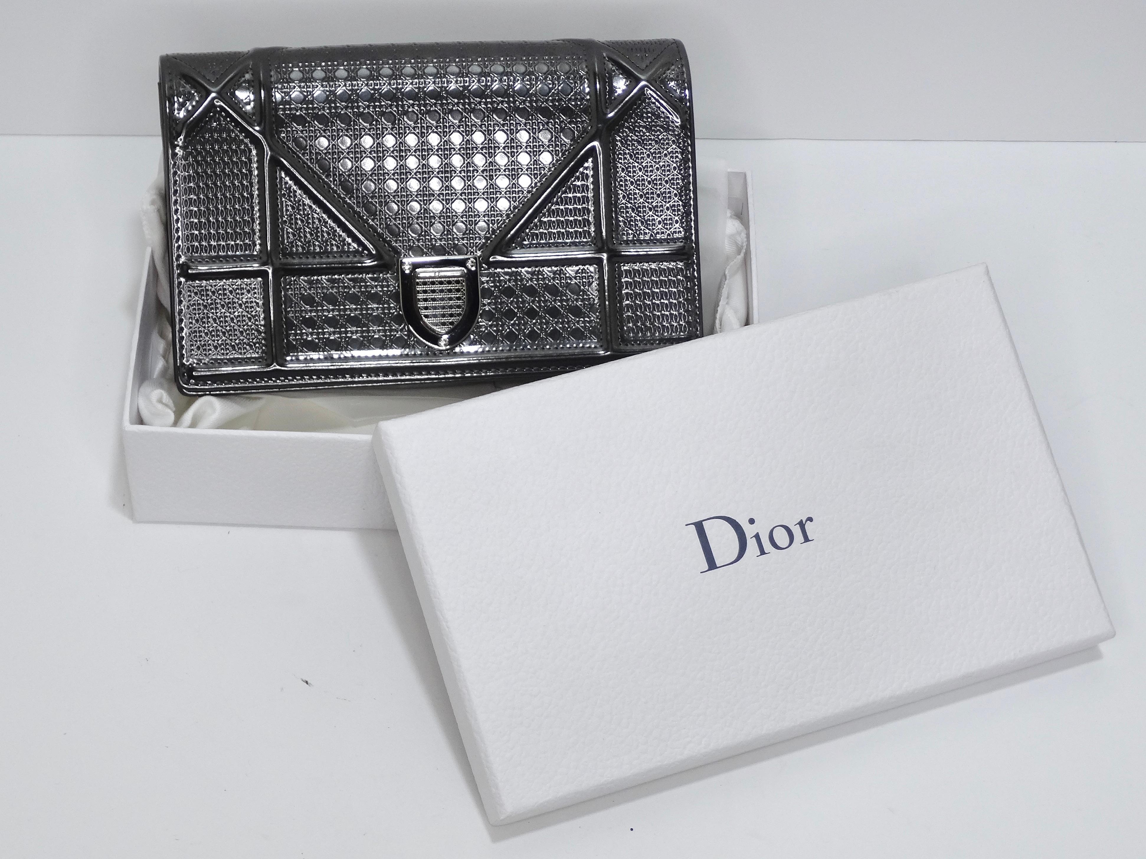 Feel modern and confident in this beautifully vibrant Dior handbag! This is a bold new line from the house of Dior debuted in 2019 that takes their classic handbags and puts a futuristic spin on them. This bag proves that Dior is for the new modern