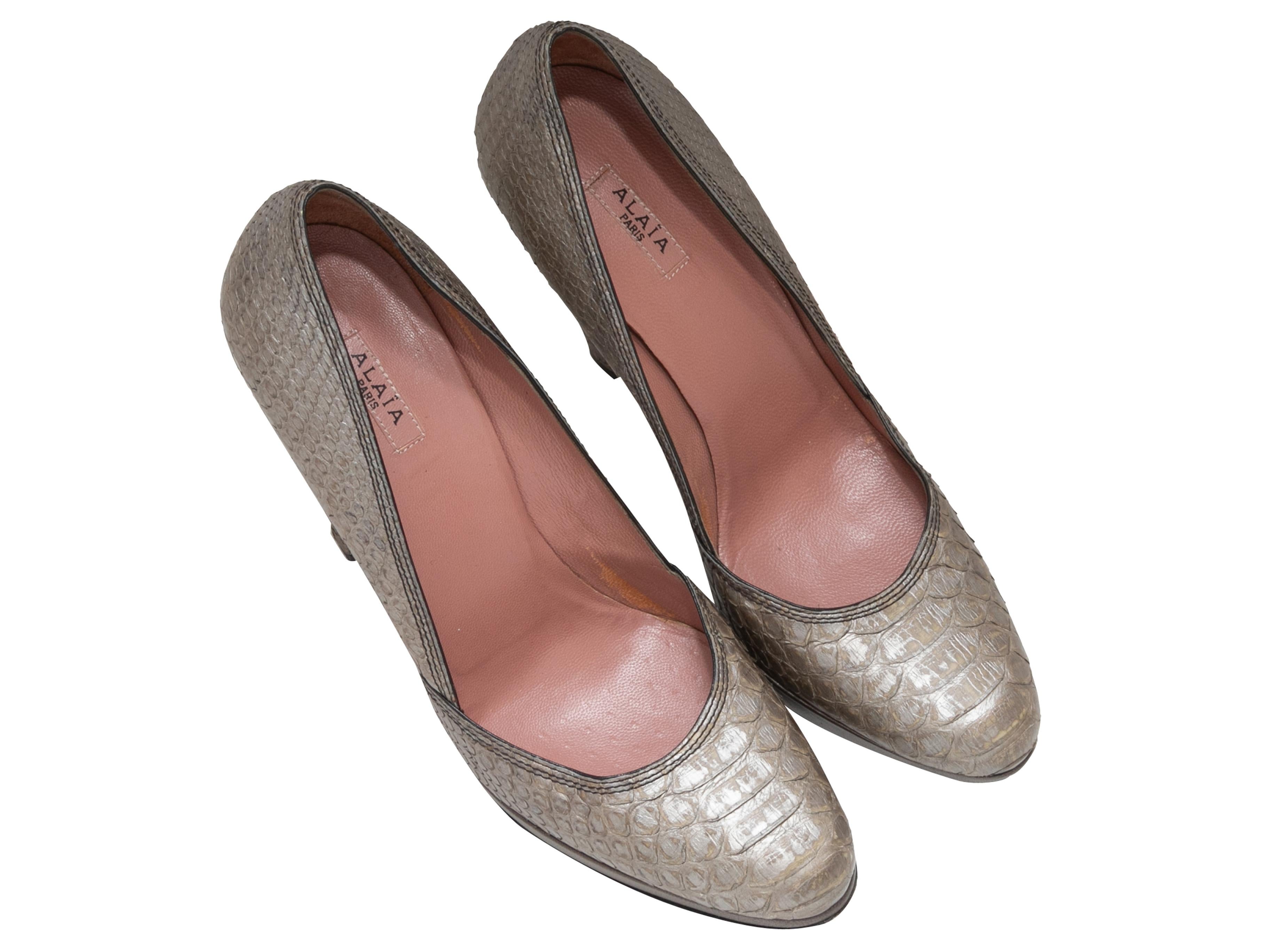  Metallic taupe python platform pumps by Alaia. 0.75