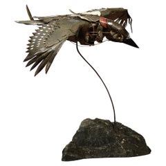 Metalwork sculpture of a Woodpecker