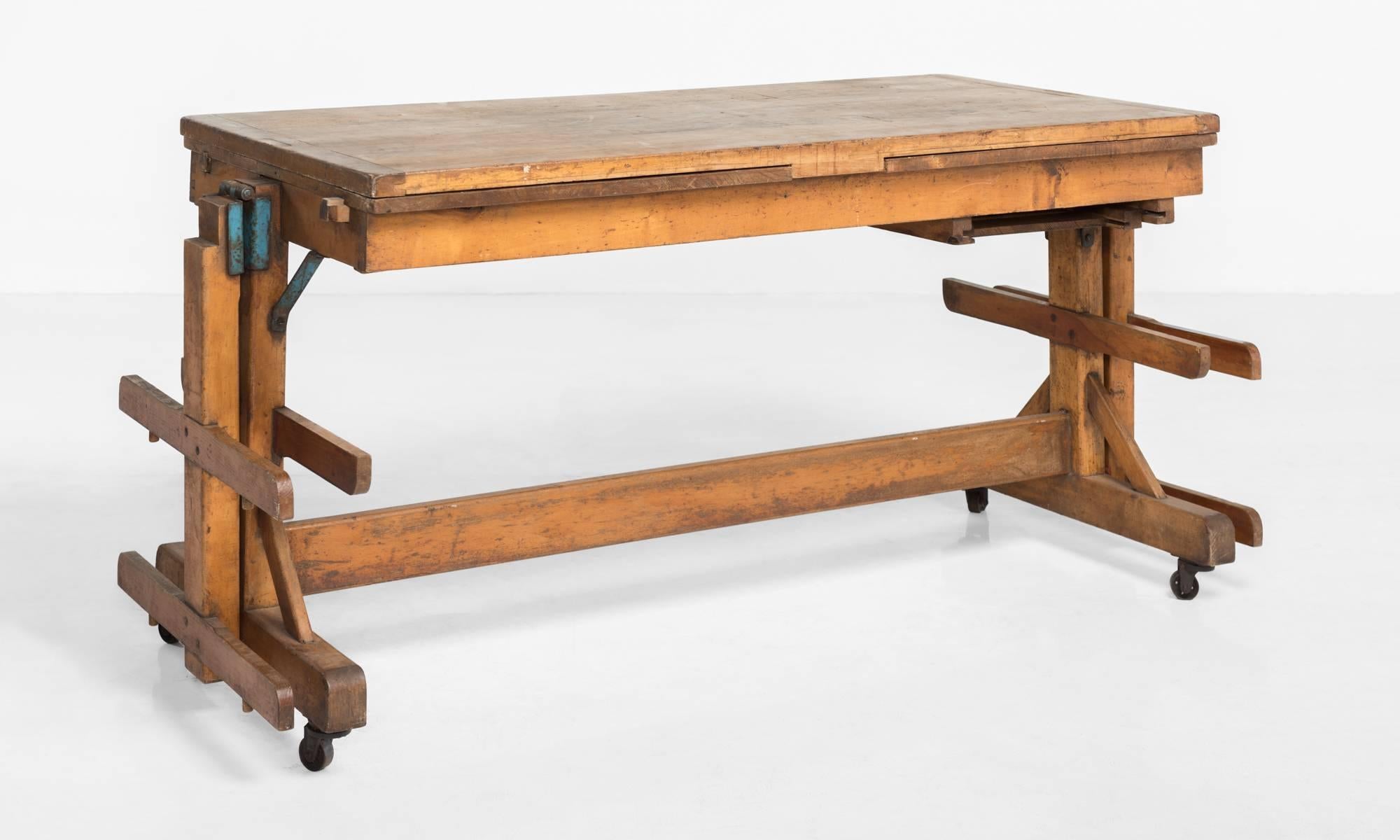 Metamorphic bakers table, circa 1900.

Unique work table with extending leaves, originally used in a bakery.

112.5