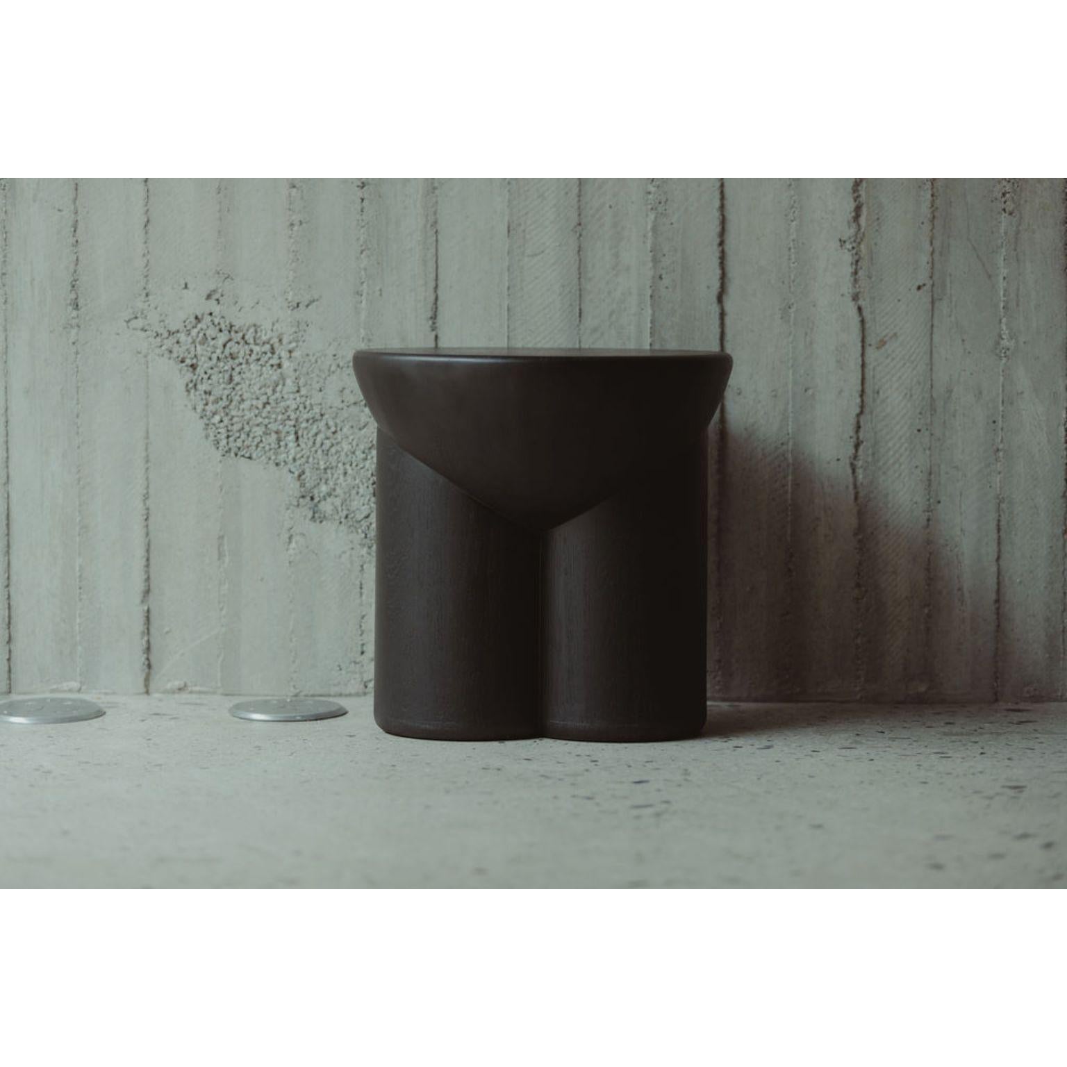 Matate Black Solid Oak Wood Stool by David Del Valle
Dimensions: D 40 x W 40 x H 40 cm.
Materials: Oak.

DAVID VALLE
We are a place, a space, a woven chair, the dreams of a craftsman, the pride of a worker, we are a way of thinking, we are moldable