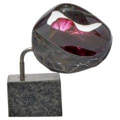 Meteorite 01, a pink & clear glass, steel & granite sculpture by Jon Lewis