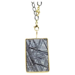 Meteorite From Sweden and 18K Yellow Gold Handmade Bezel Pendant on Black Chain