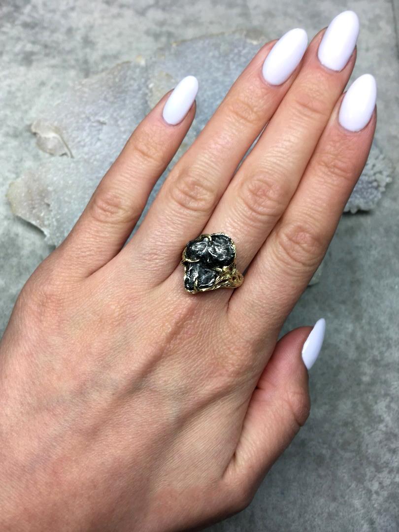 14K yellow gold ring with natural iron Meteorite
stone measurements - 0.12 x 0.47 x 0.75 in / 3 x 12 x 19 mm
meteorite weight - 15.20 carats
ring size - 7.5 US (this ring may be resized, please contact us for further information) 
ring weight - 6.68
