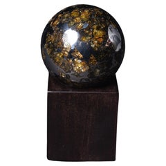 Meteorite Sphere from the Seymchan Meteorite with Amber-Coloured Olivine Gems