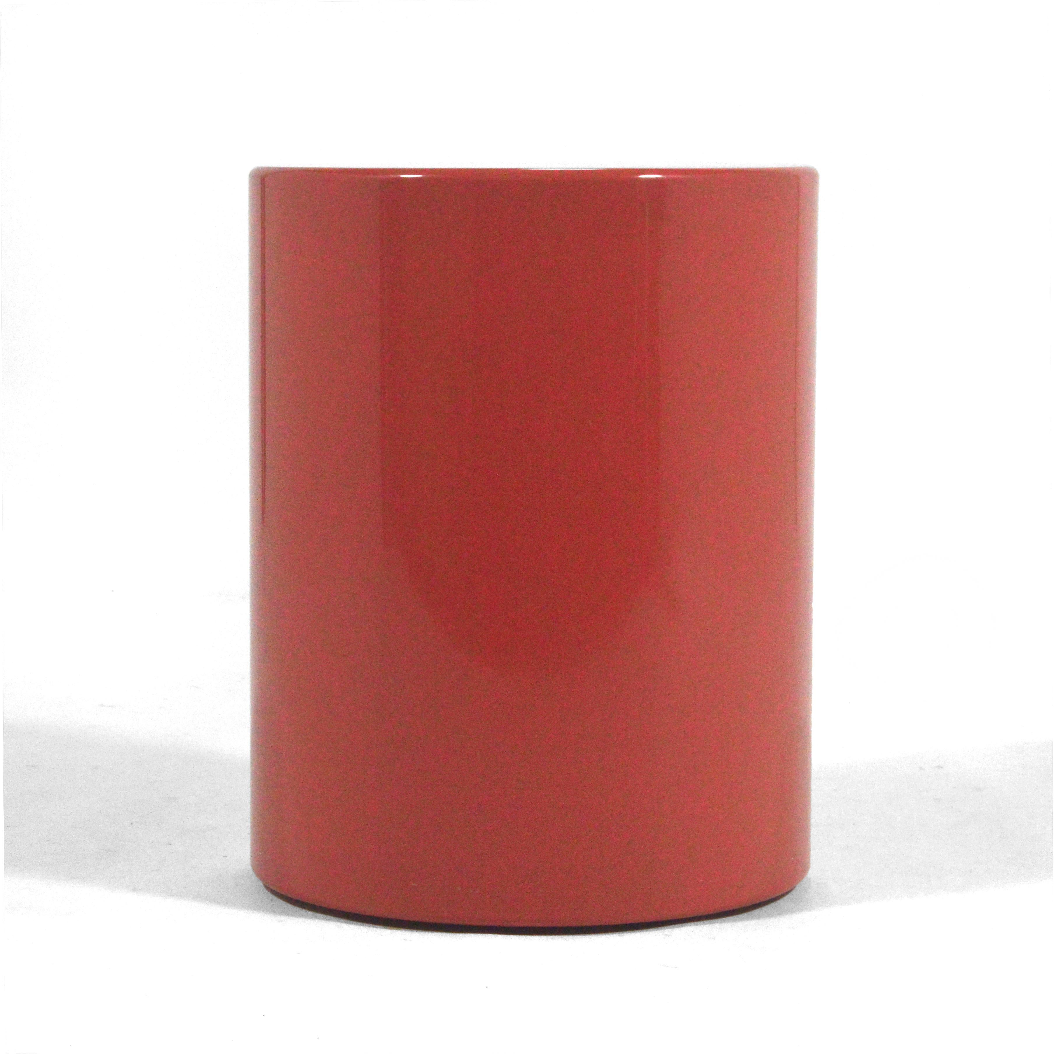 This minimalist, cylindrical side table or pedestal by Metro is finished in a beautiful 