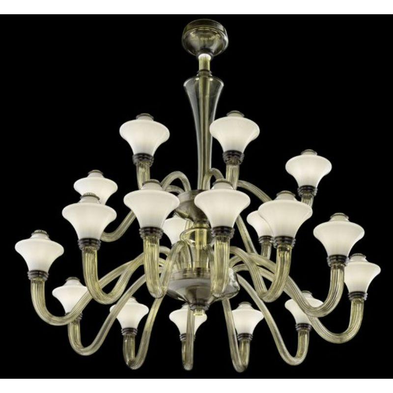 Metropolis is a collection that forcefully evokes the class, symmetrical and plastic forms of Art Deco, shaped by a harmonious, fluid rhythm. The chandelier has a central body in the form of a chalice, from which arms extend, crafted by hand in