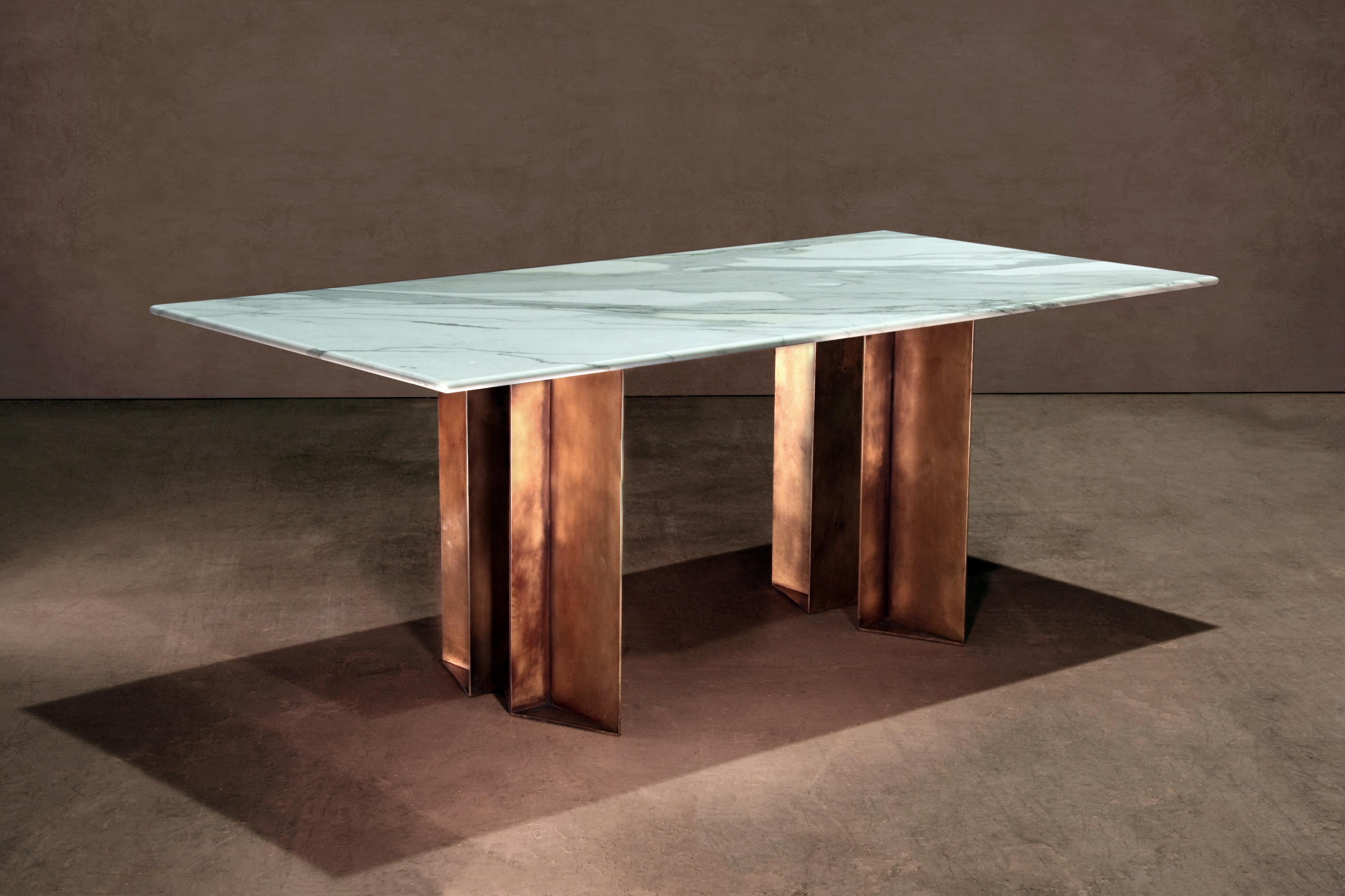 Dining table in Calacatta Bourghini and patinated brass. A collaboration between novocastrian and architecture and interior design studio Lind and Almond. Handcrafted in North East, England.

Measures: 200cm (length) x 100cm (depth) x 75cm (height).