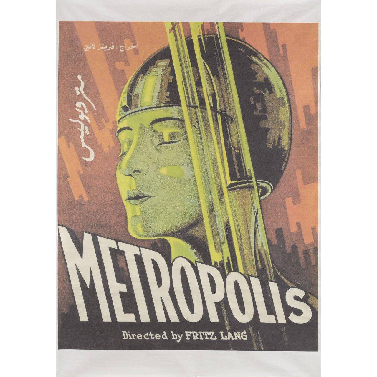 Original 2000s re-release Egyptian B1 poster for the 1927 film Metropolis directed by Fritz Lang with Alfred Abel / Gustav Frohlich / Rudolf Klein-Rogge / Fritz Rasp. Very Good-Fine condition, rolled. Please note: the size is stated in inches and