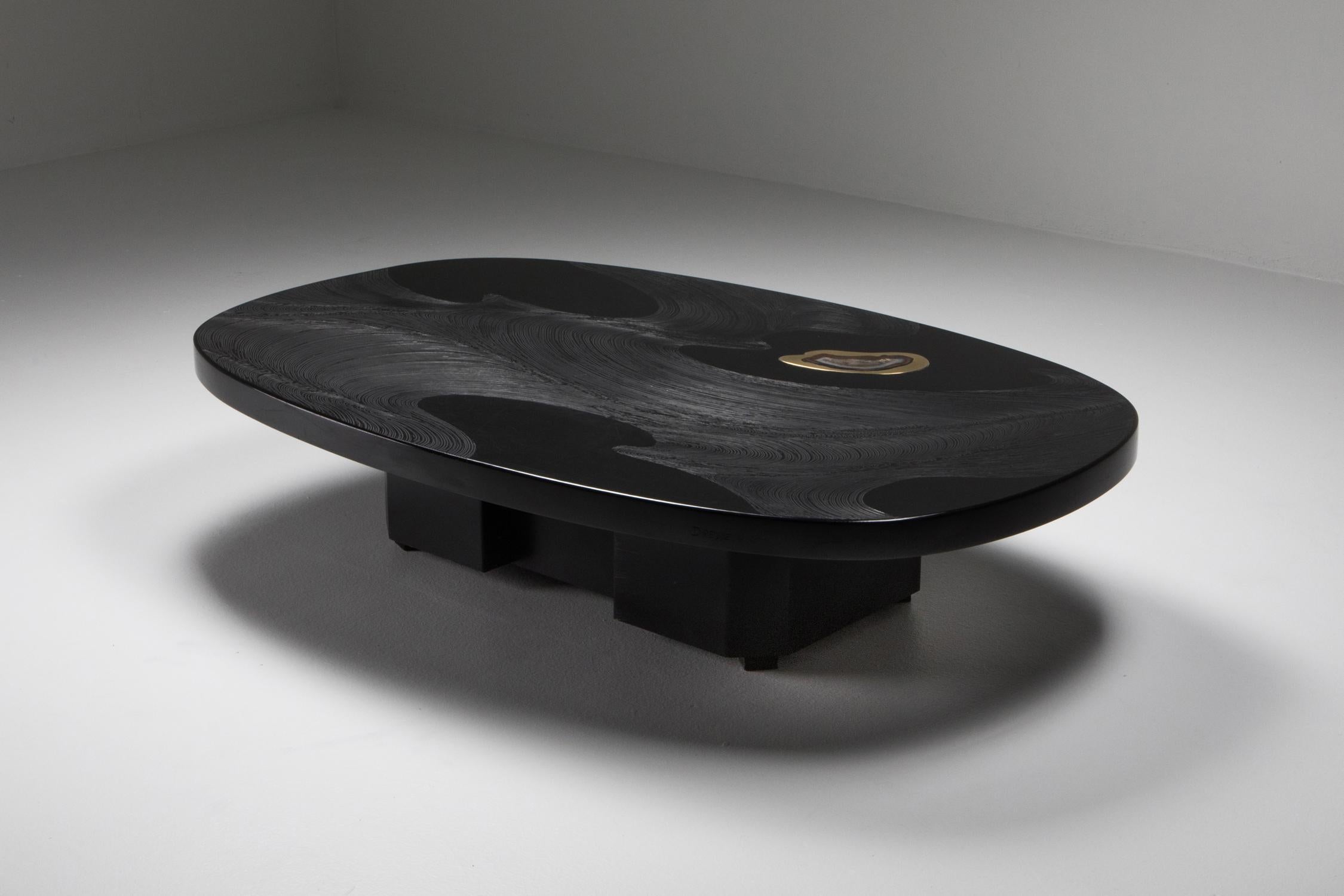 Jean Claude Dresse, large coffee table at 144 cm wide, black resin, brass, agate and steel, Belgium, 1980s
The piece has its original base, but our in house atelier could provide a bespoke base.
Black resin tabletop that is inlayed with brass and