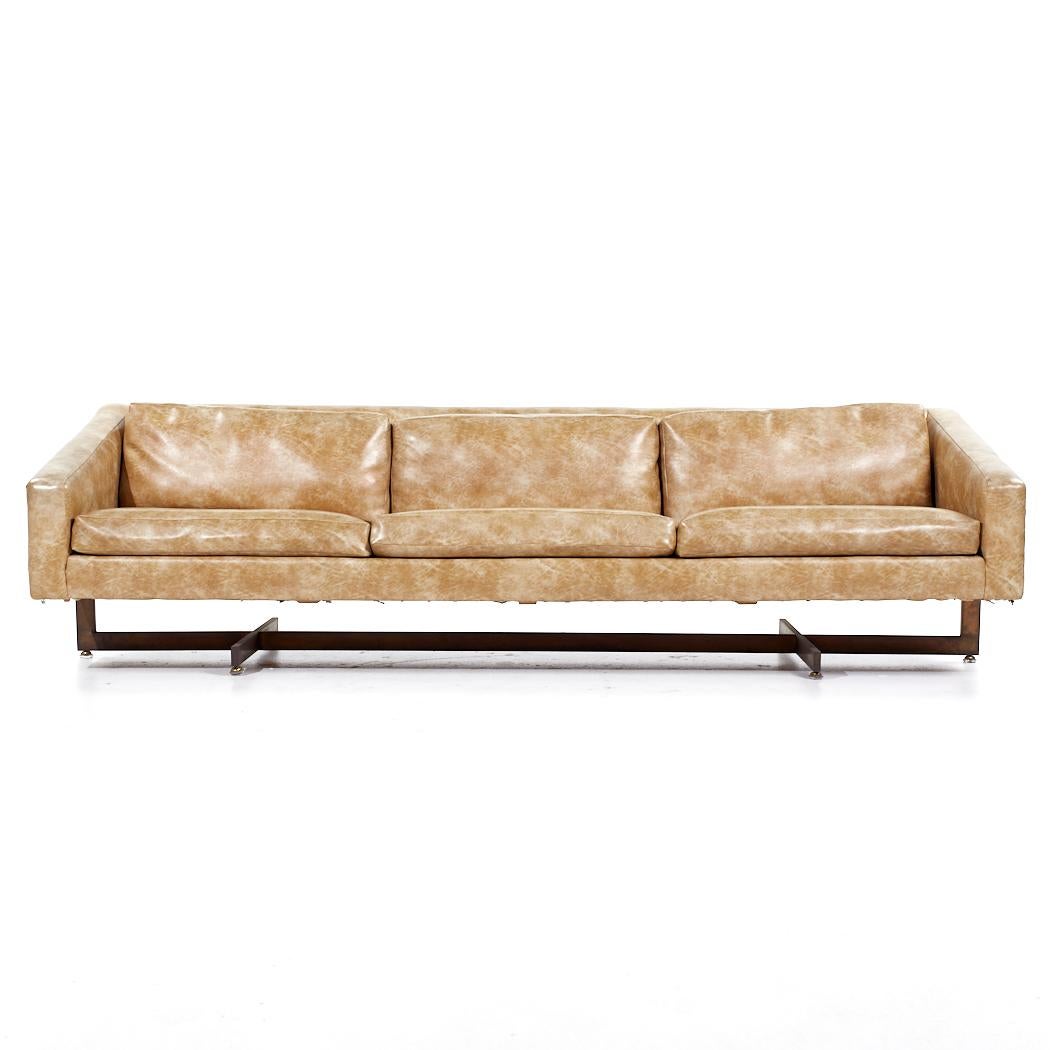 Metropolitan Mid Century Bronze Base Sofa

This sofa measures: 96 wide x 32 deep x 26.5 inches high, with a seat height of 17 and arm height of 20 inches

All pieces of furniture can be had in what we call restored vintage condition. That means the