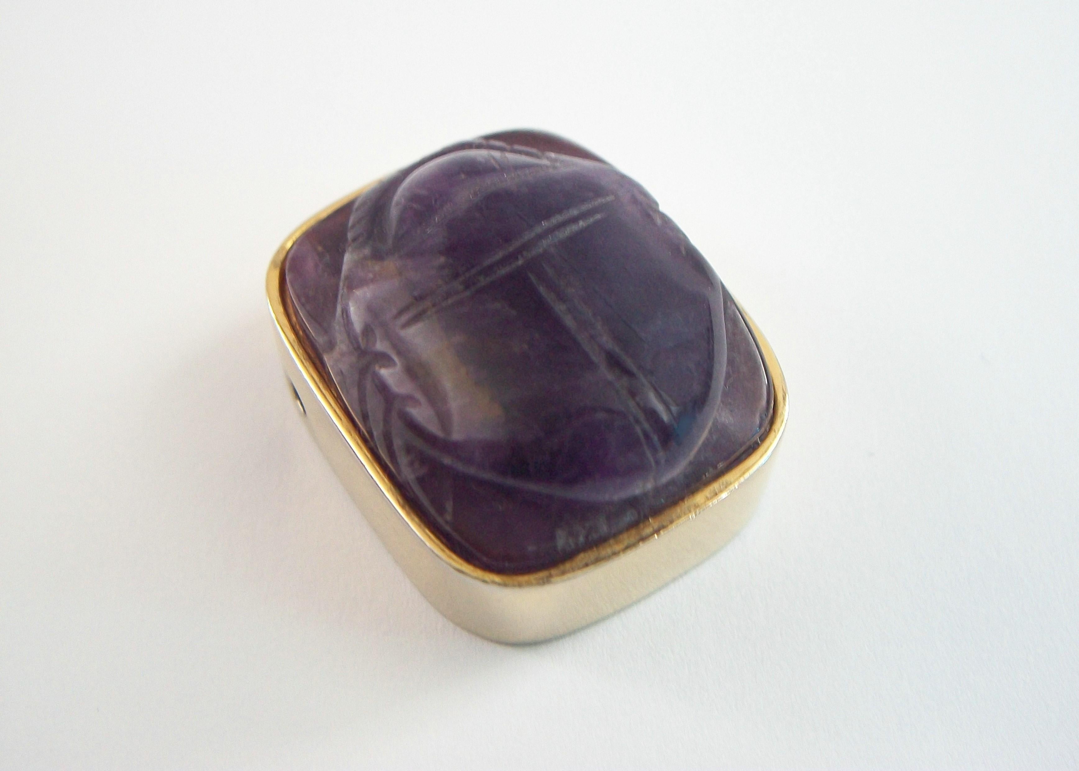 METROPOLITAN MUSEUM OF ART - Egyptian revival carved amethyst scarab beetle pendant - the scarab gemstone (approx. 42.34 total carat weight - 27 mm. long x 22 mm. wide x 10 mm. deep) bezel set in vermeil (sterling silver with a gold wash) with holes