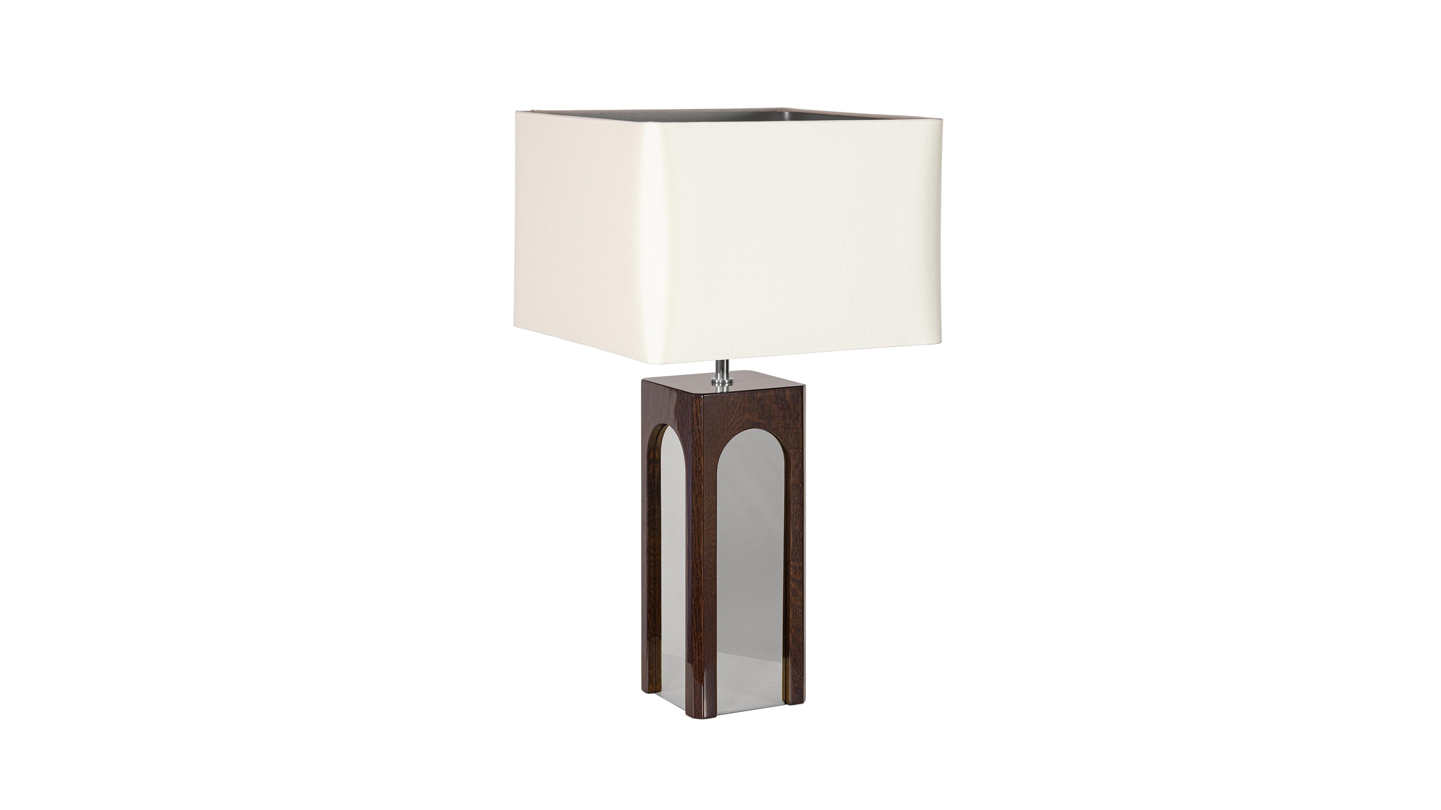 Metropolitan Oak Table Lamp by InsidherLand
Dimensions: D 35 x W 35 x H 65 cm.
Materials: Satin, wood structure with translucent dark brown in high gloss varnish and polished nickel.
4 kg.

Located in New York, USA, the Lincoln square is famous for