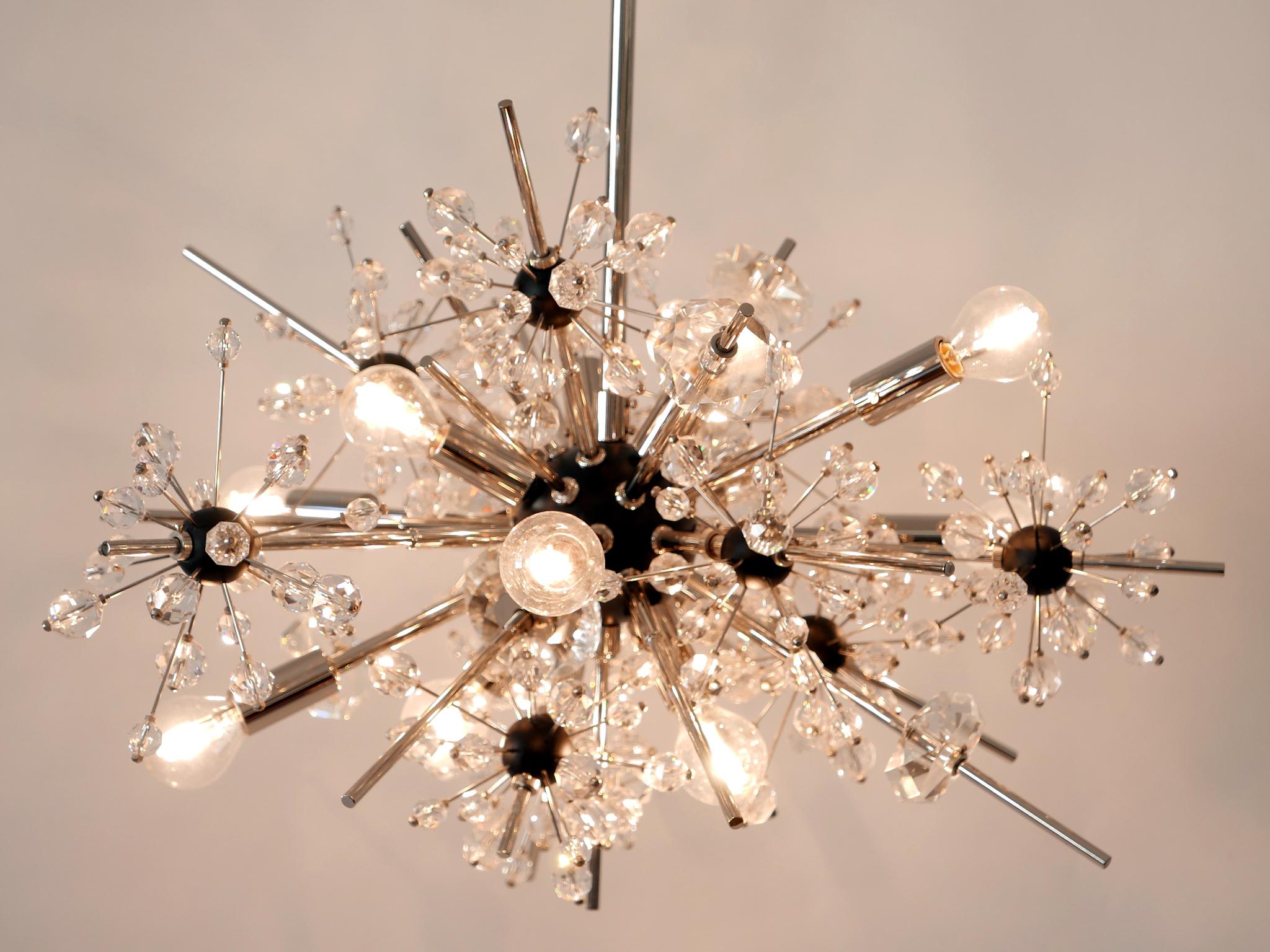 Spectacular and highly decorative sputnik chandelier series 6725-D-11 – Metropolitan Opera Foyer. Designed by Hans Harald Rath, 1963 for J. & L. Lobmeyr. Manufactured probably in 2000s.

Executed in nickel-plated brass, hand-cut crystals, Swarovski
