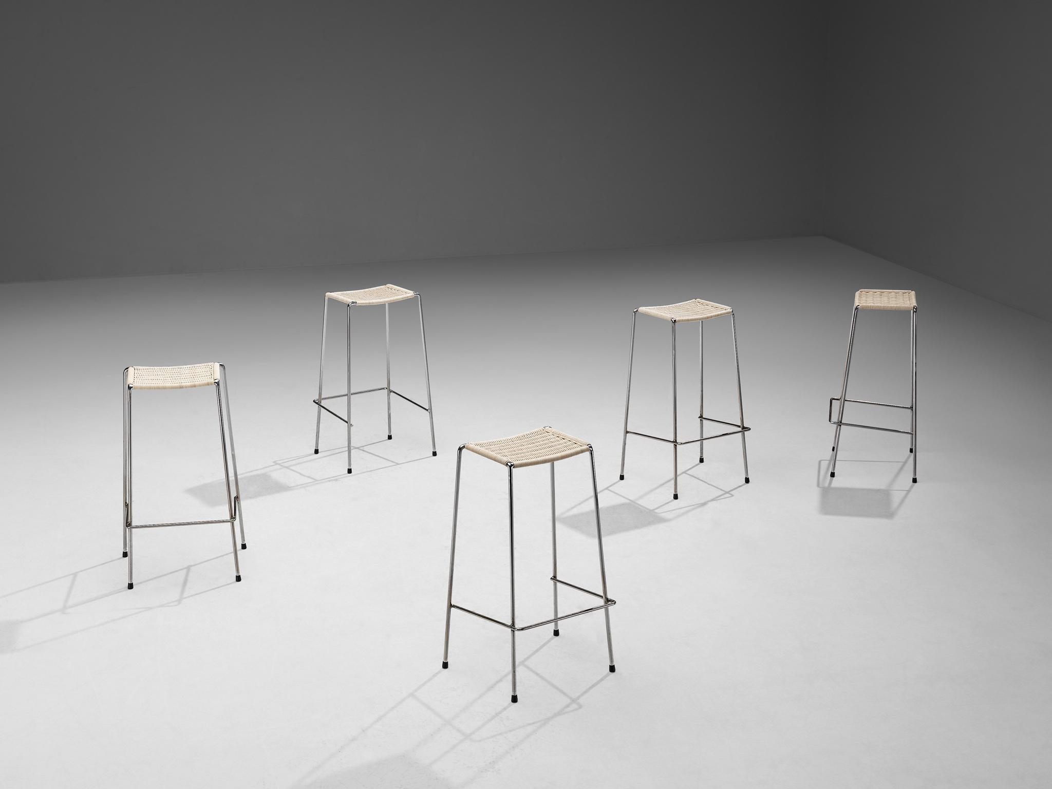 Metz & Co, set of five bar stools, cane, chrome-plated metal, The Netherlands, 1970s. 

Set of five modern bar stools manufactured by the well-known Dutch manufacturer of design furniture Metz & Co. These bar stools feature a slender chrome frame,