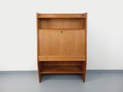 Meuble secrétaire bibliothèque de rangement vintage en bois de chêne années 60